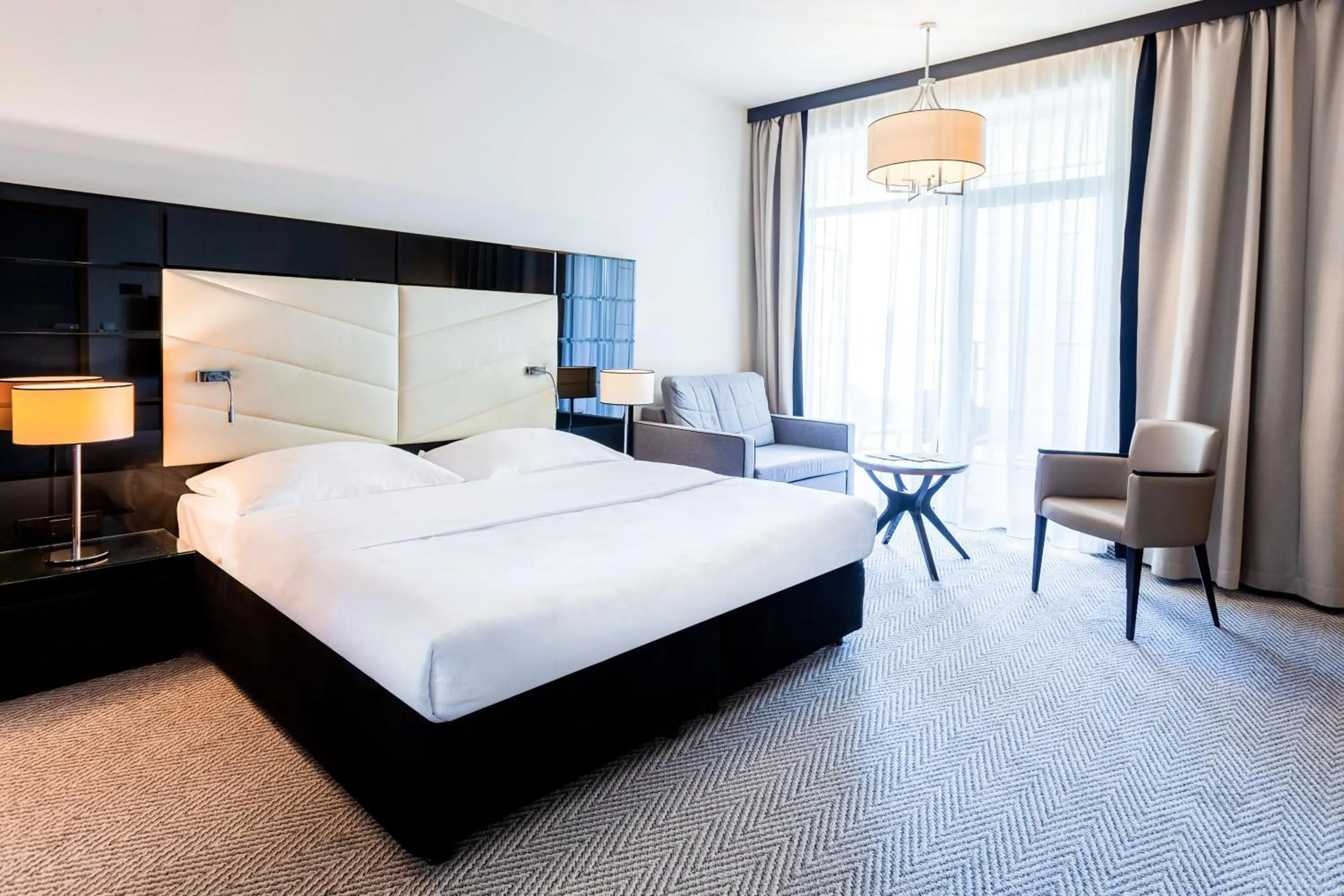 Photo of the whole room, Bed in Diune Hotel by Zdrojowa