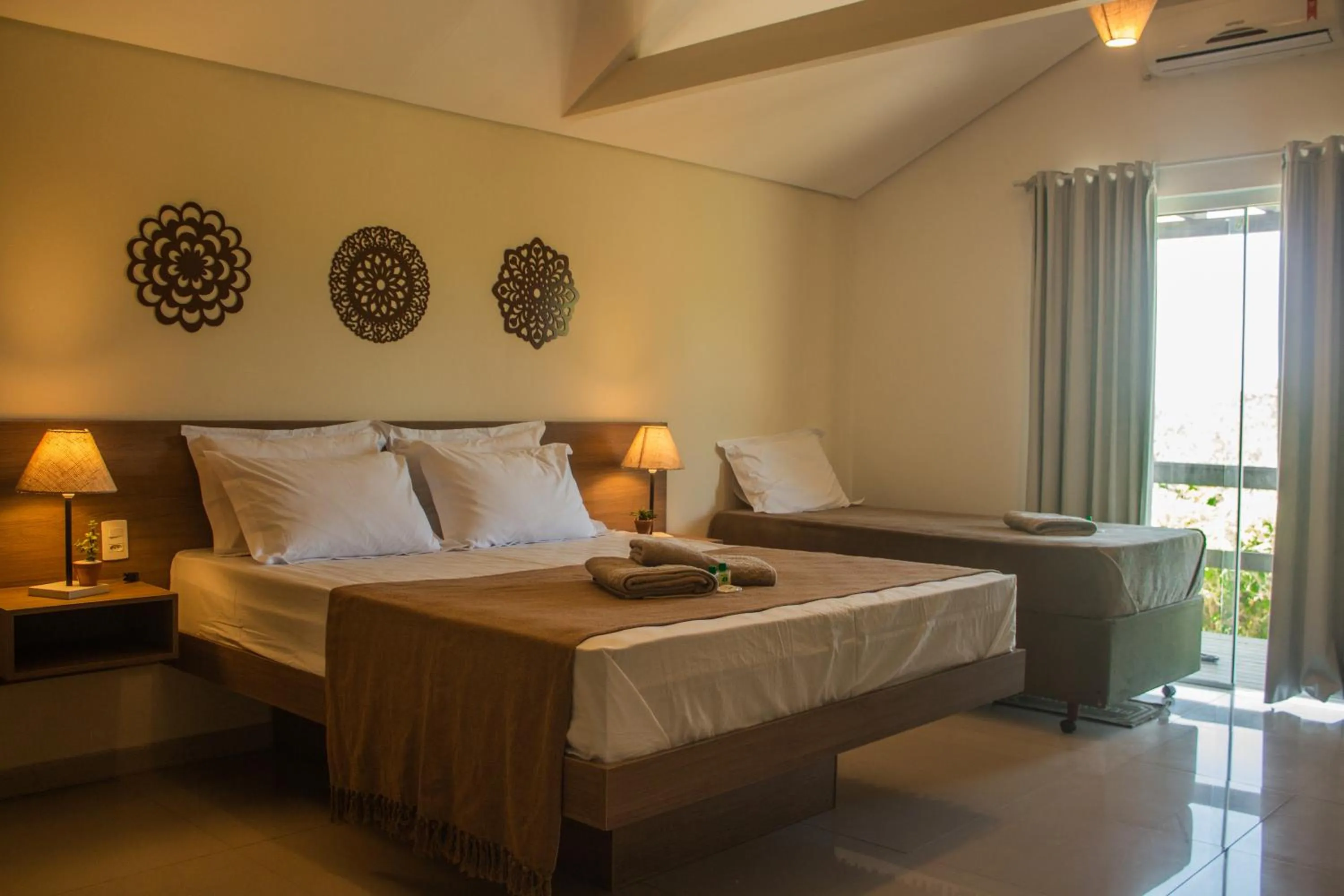 Bed in Pousada Xaxá