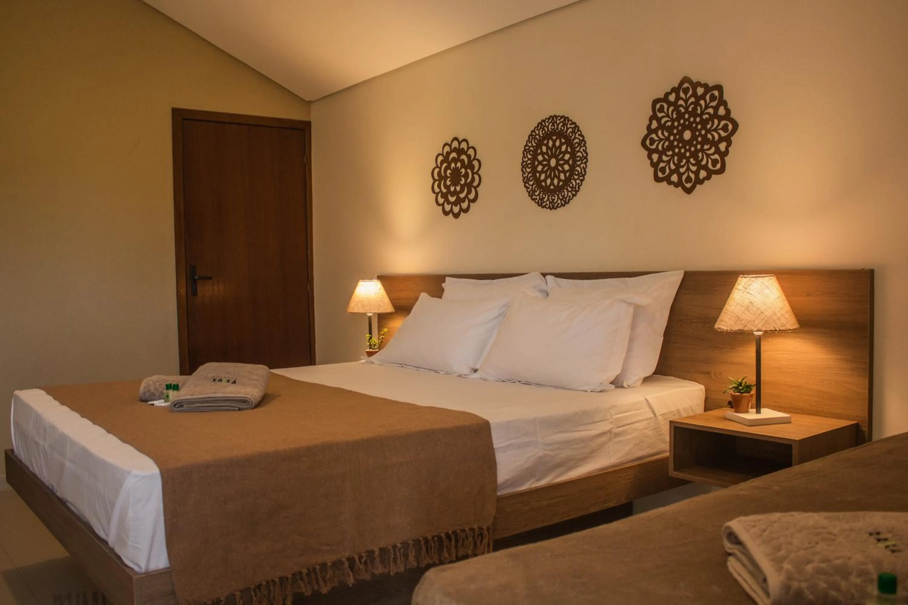 Bed in Pousada Xaxá