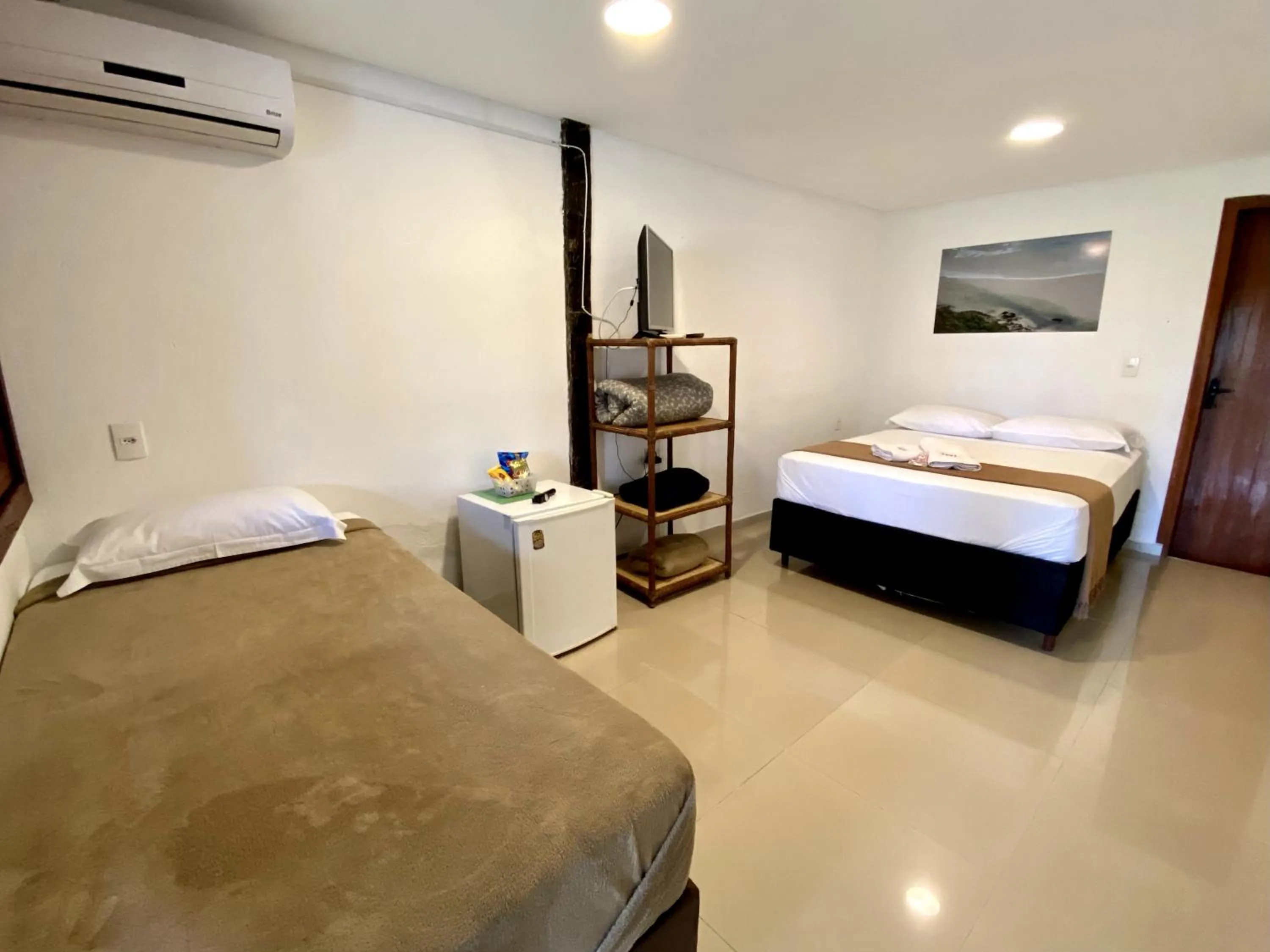 Bed in Pousada Xaxá