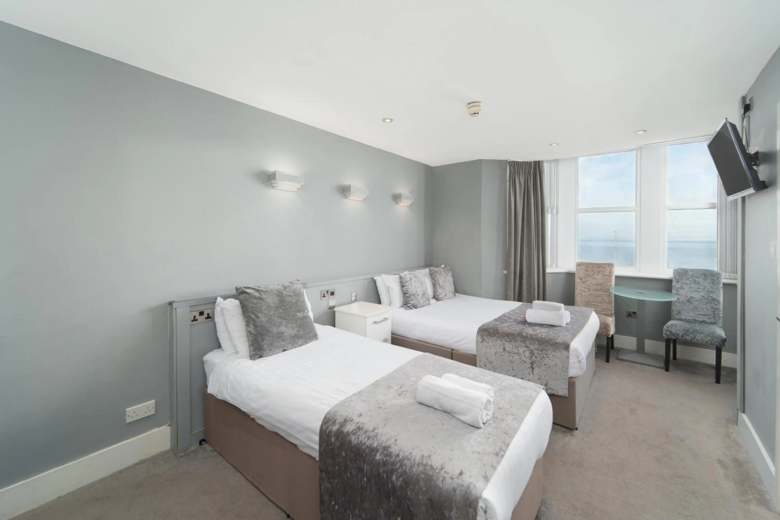 Bed in The Royal Boston Hotel by Compass Hospitality