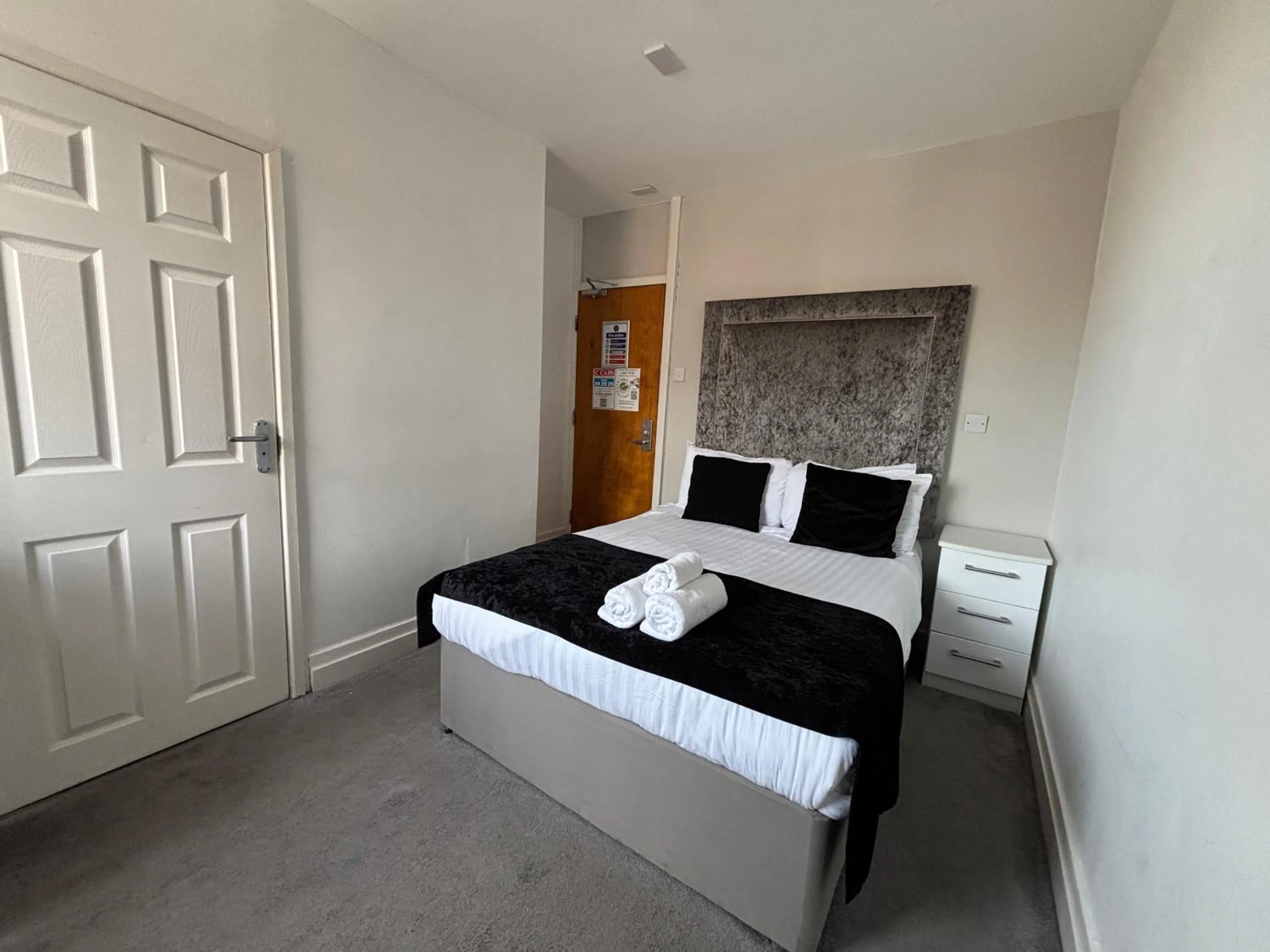 Bed in The Royal Boston Hotel by Compass Hospitality