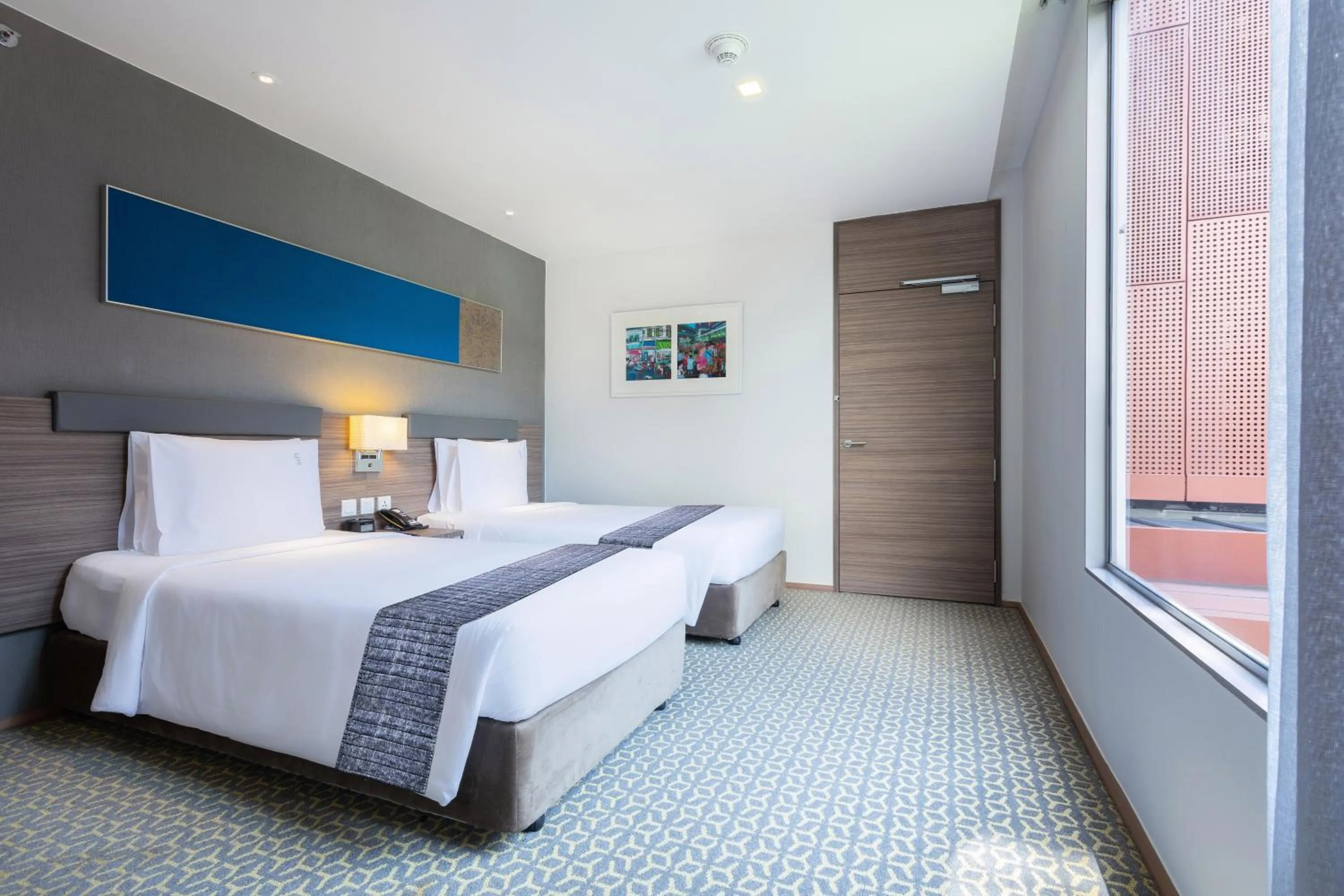 Bed in Holiday Inn Express Bangkok Sathorn by IHG
