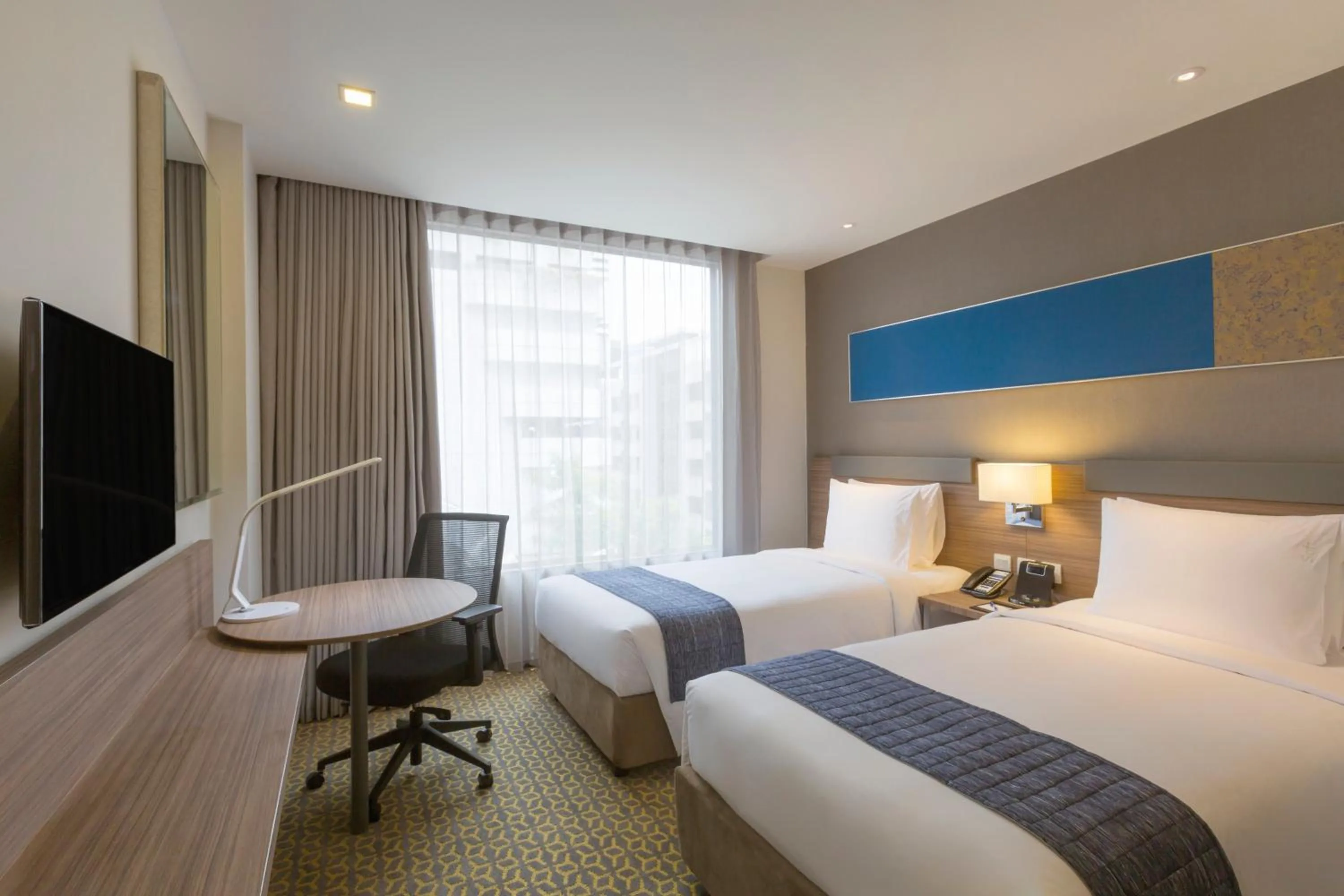 Photo of the whole room, Bed in Holiday Inn Express Bangkok Sathorn by IHG