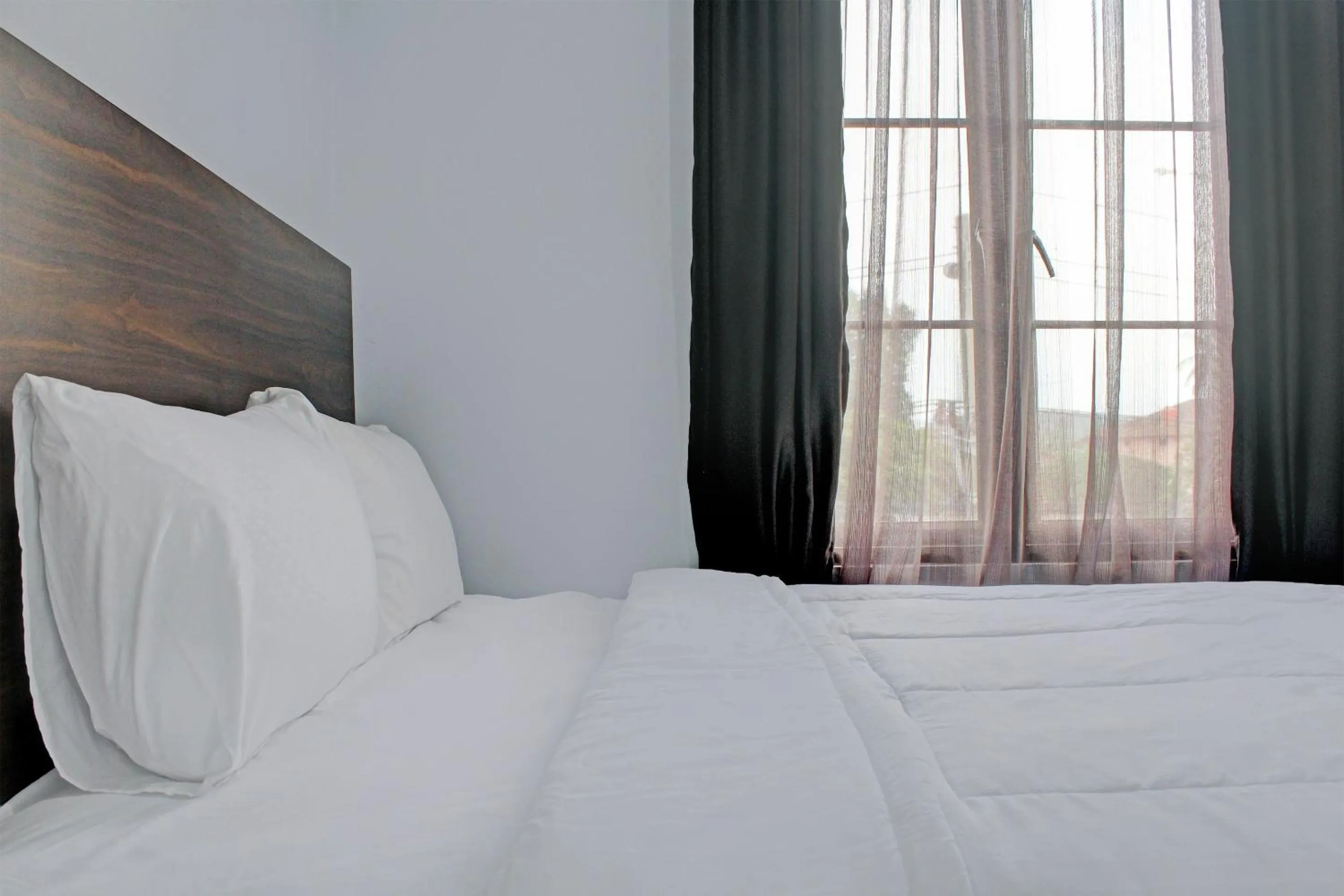 Bedroom in Capital O 92583 Raja Soeta Hostel Syariah