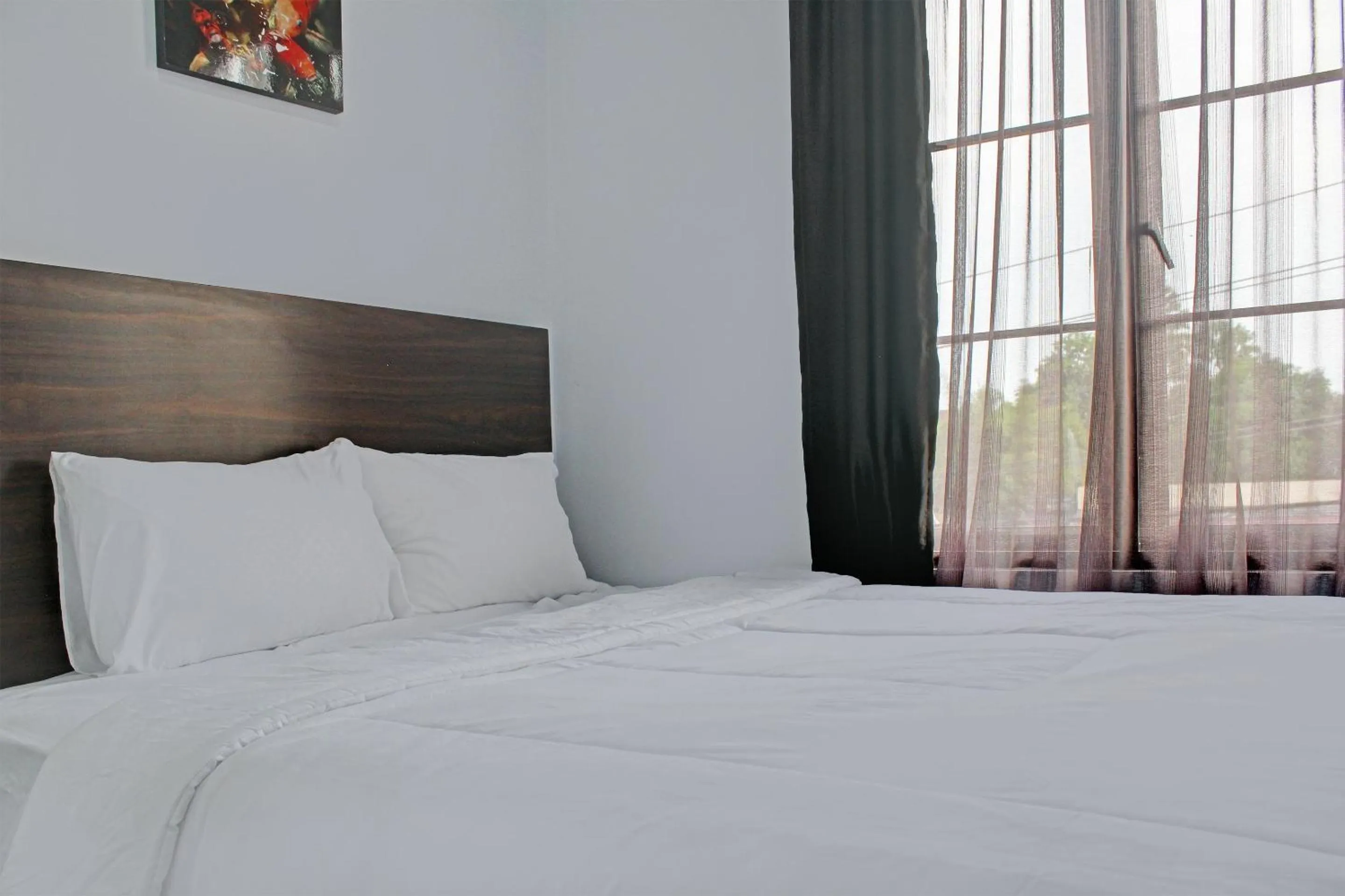 Bedroom in Capital O 92583 Raja Soeta Hostel Syariah