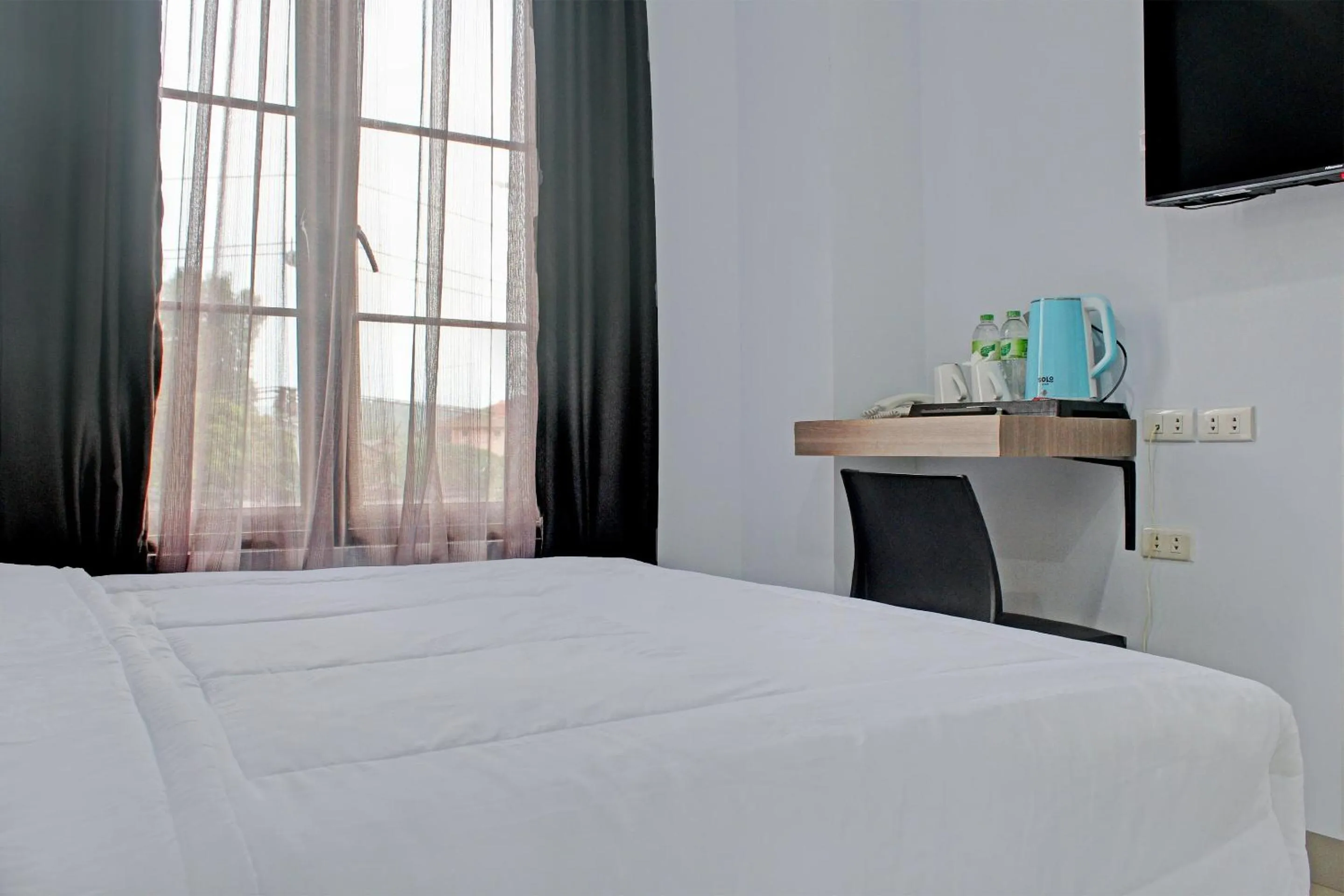 Bedroom in Capital O 92583 Raja Soeta Hostel Syariah