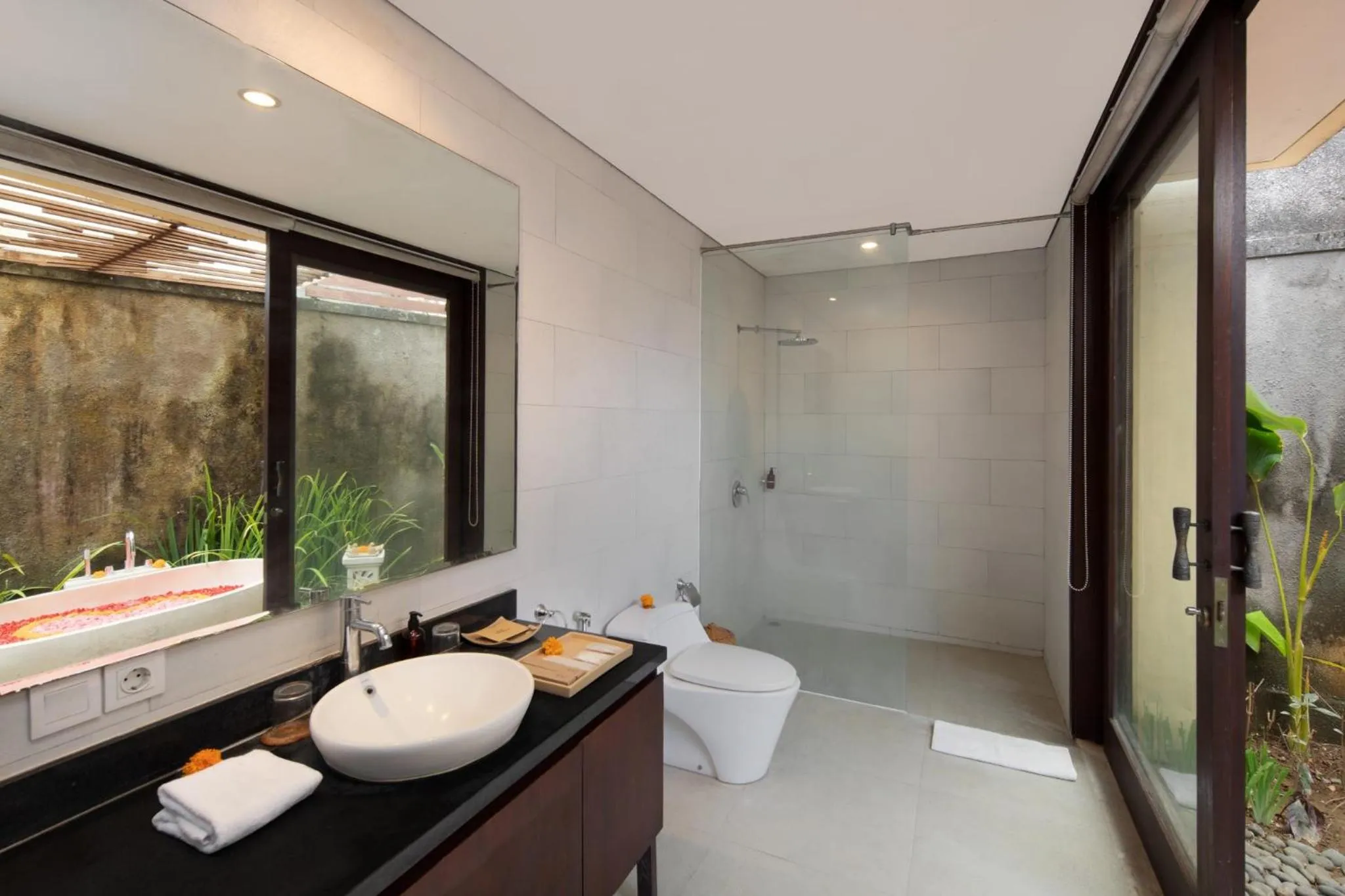 Bathroom in Canggu Circle Villa by Ini Vie Hospitality