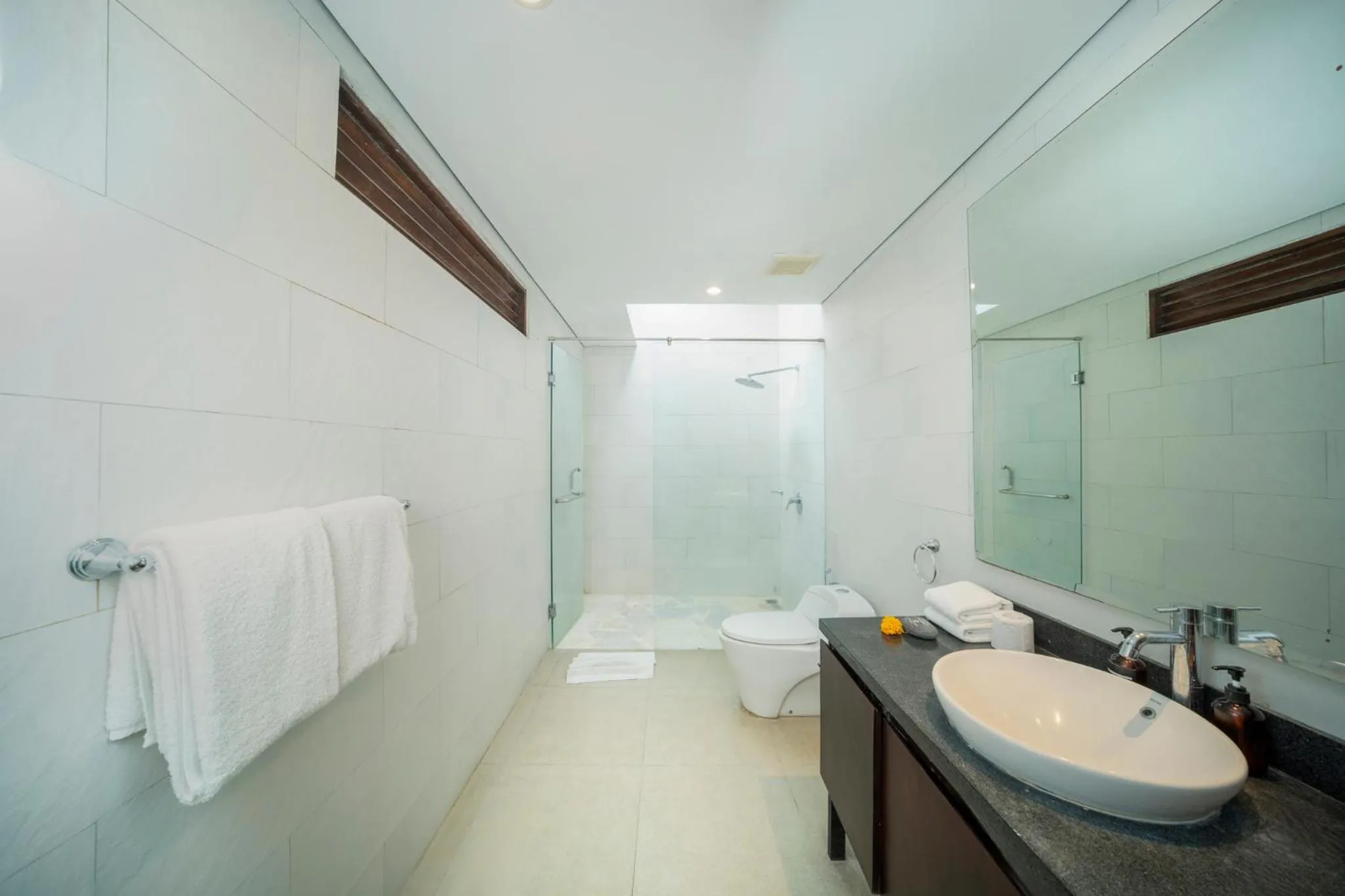 Bathroom in Canggu Circle Villa by Ini Vie Hospitality