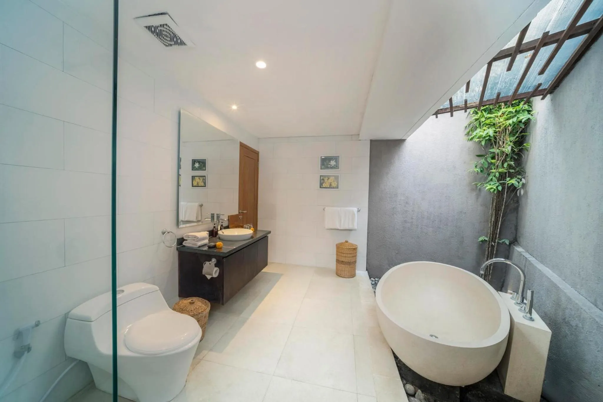 Bathroom in Canggu Circle Villa by Ini Vie Hospitality