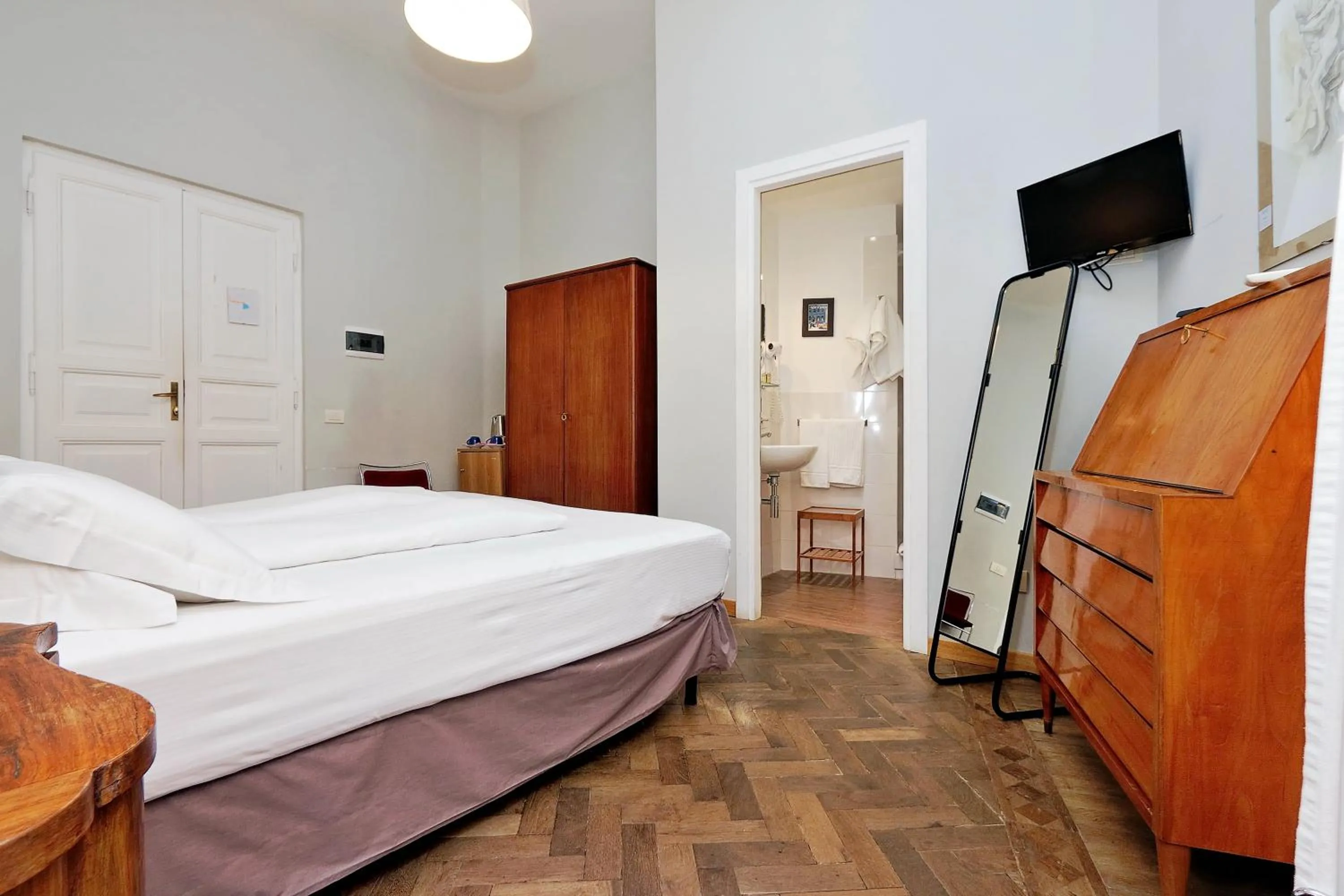 Photo of the whole room, Bed in Cassiodoro19