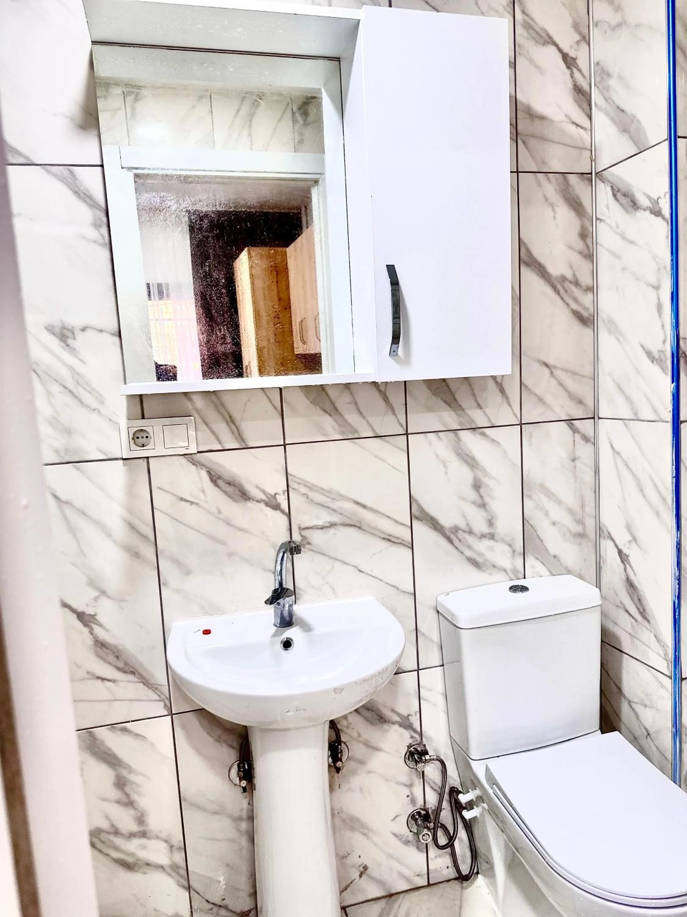 Shower in Alaca Suit