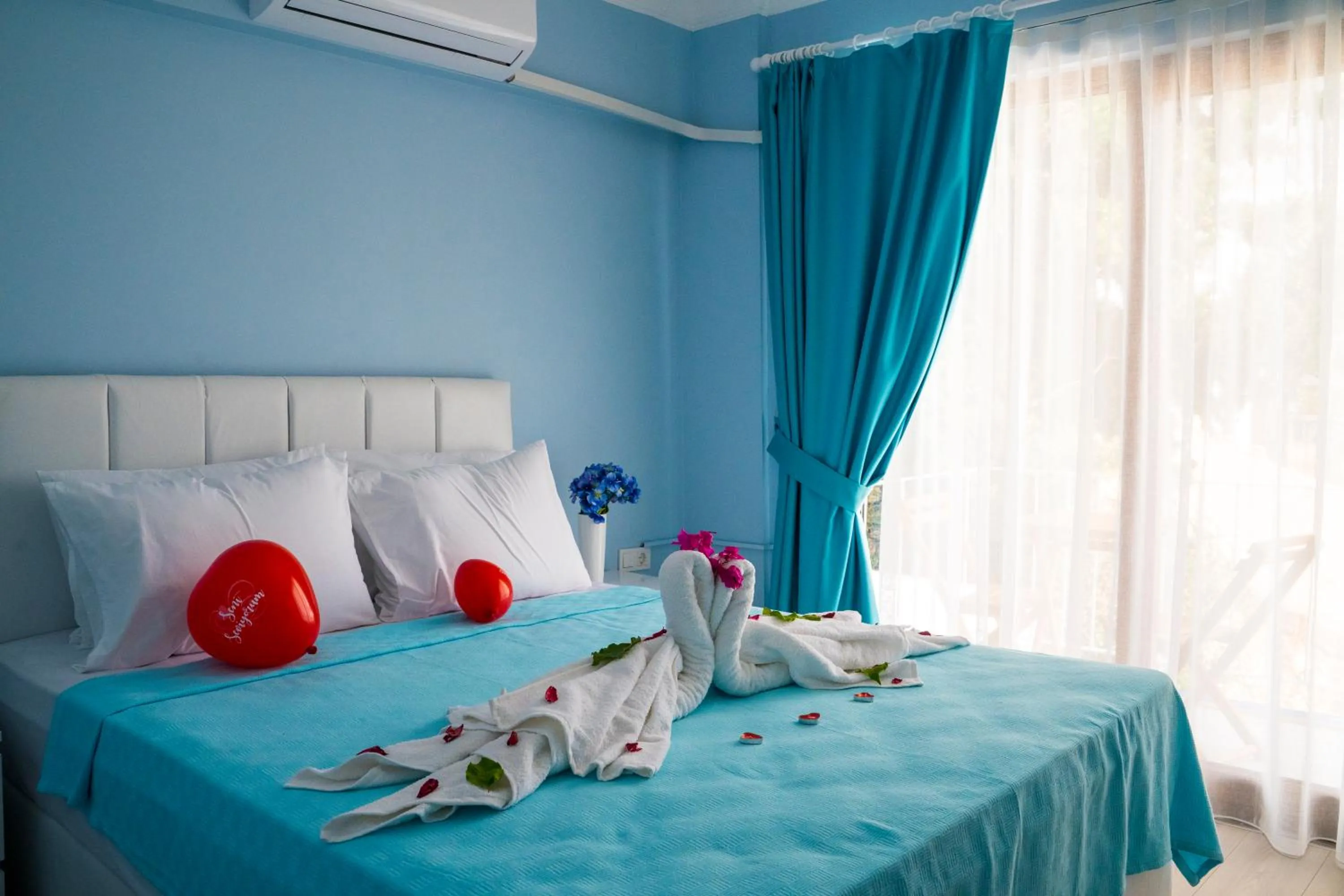 Bed in Marquis Blue Hotel