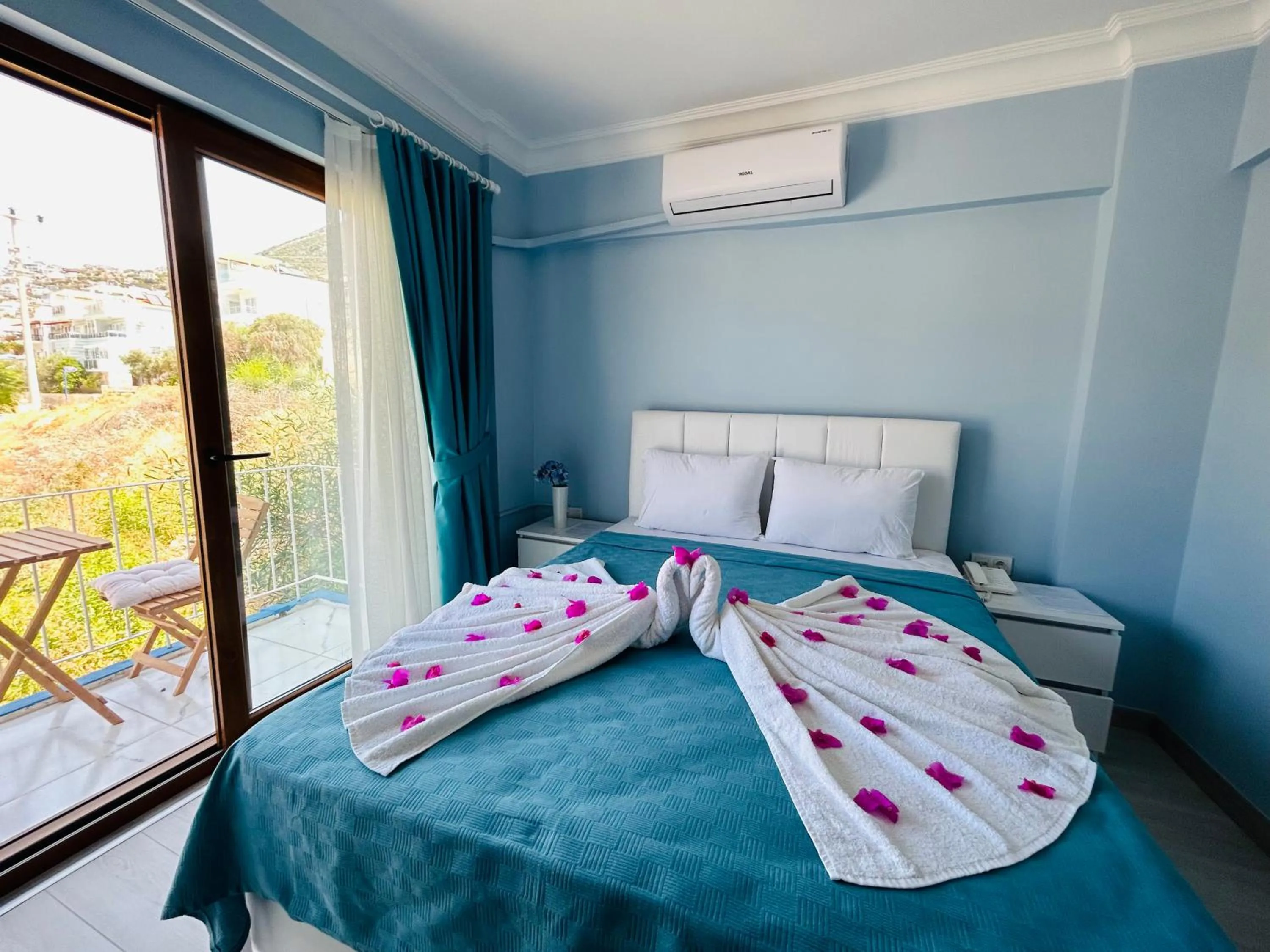 Bed in Marquis Blue Hotel