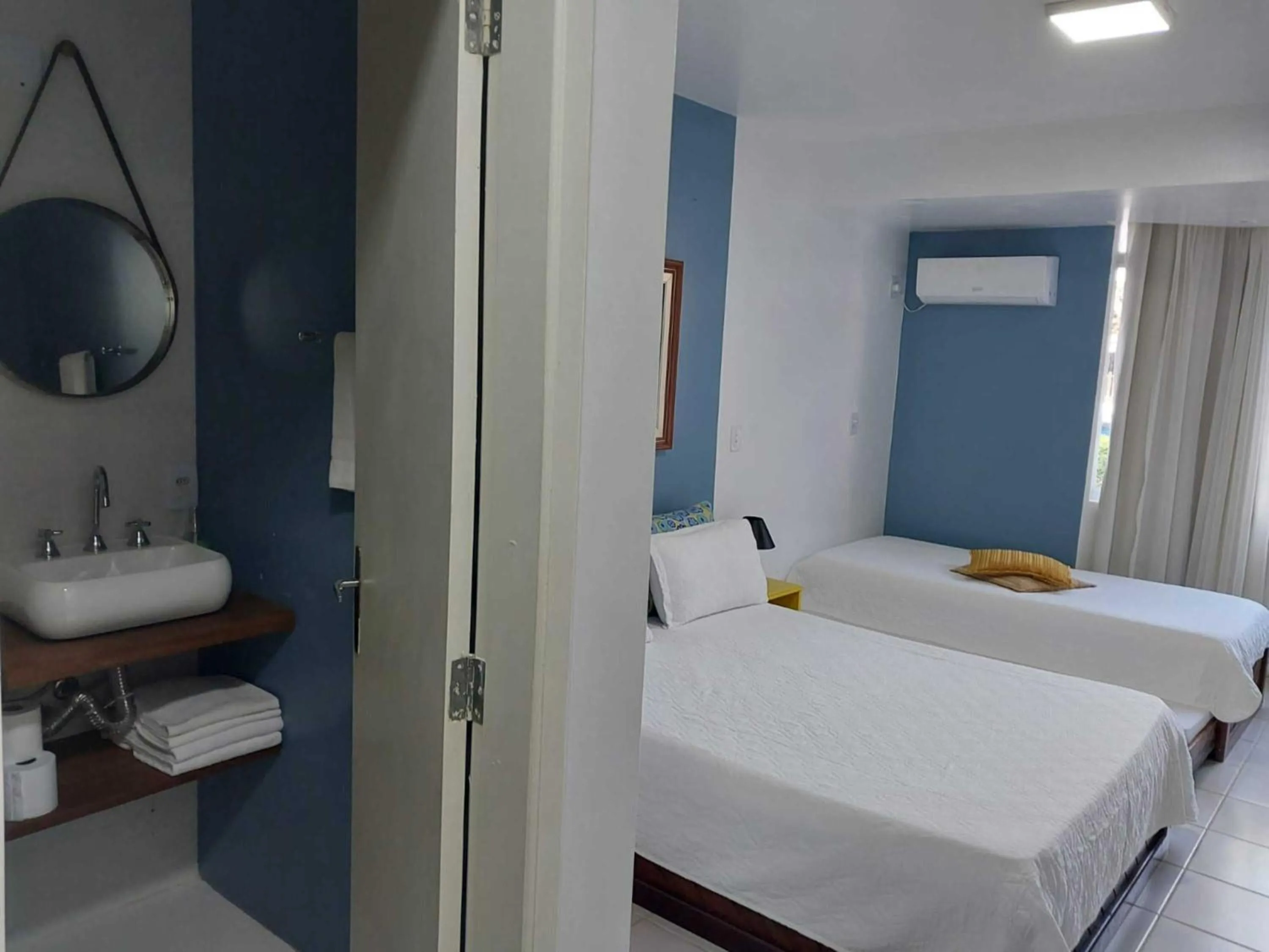 Bed in Flamboyant Hotel