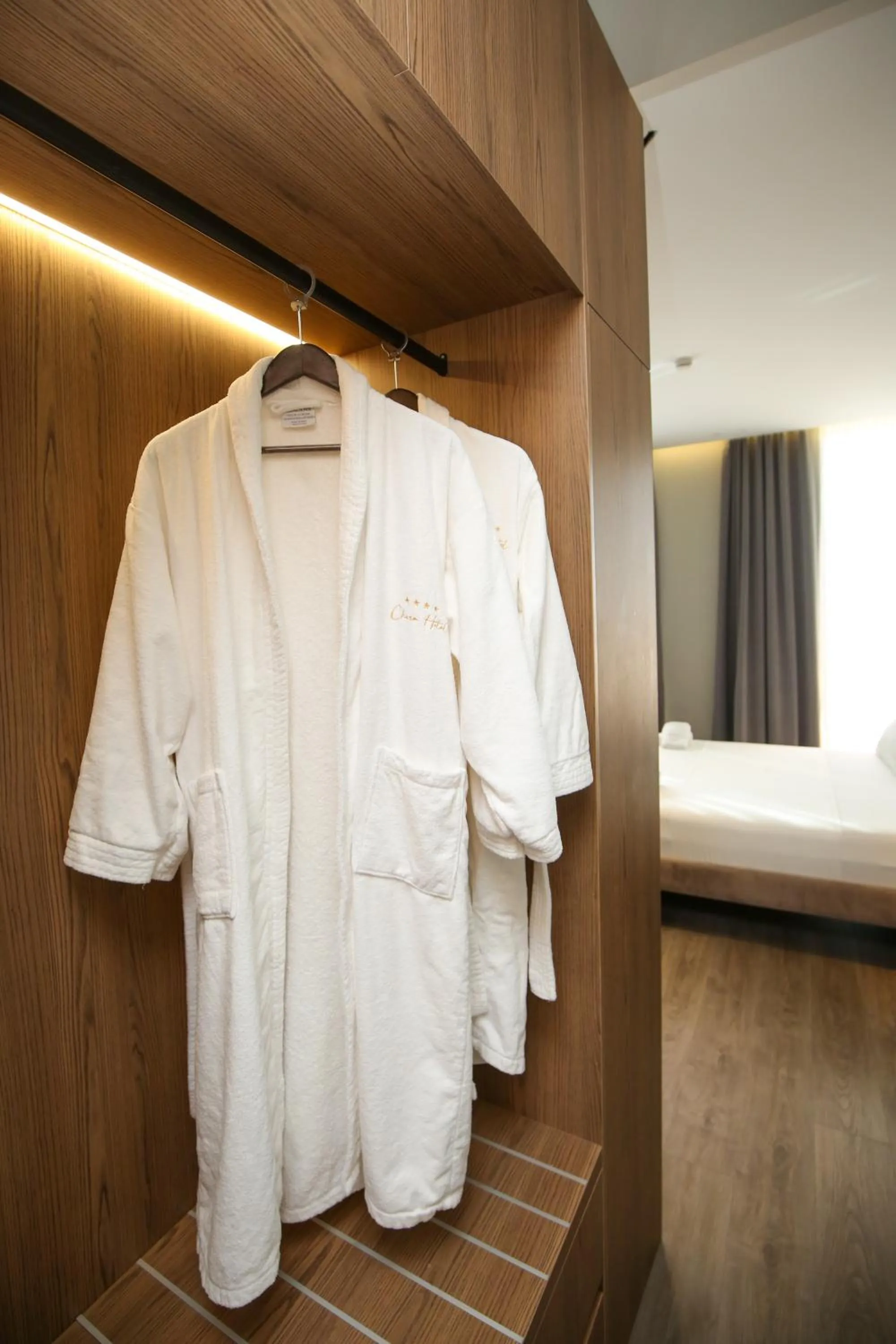 towels, Bed in Charm Hotel