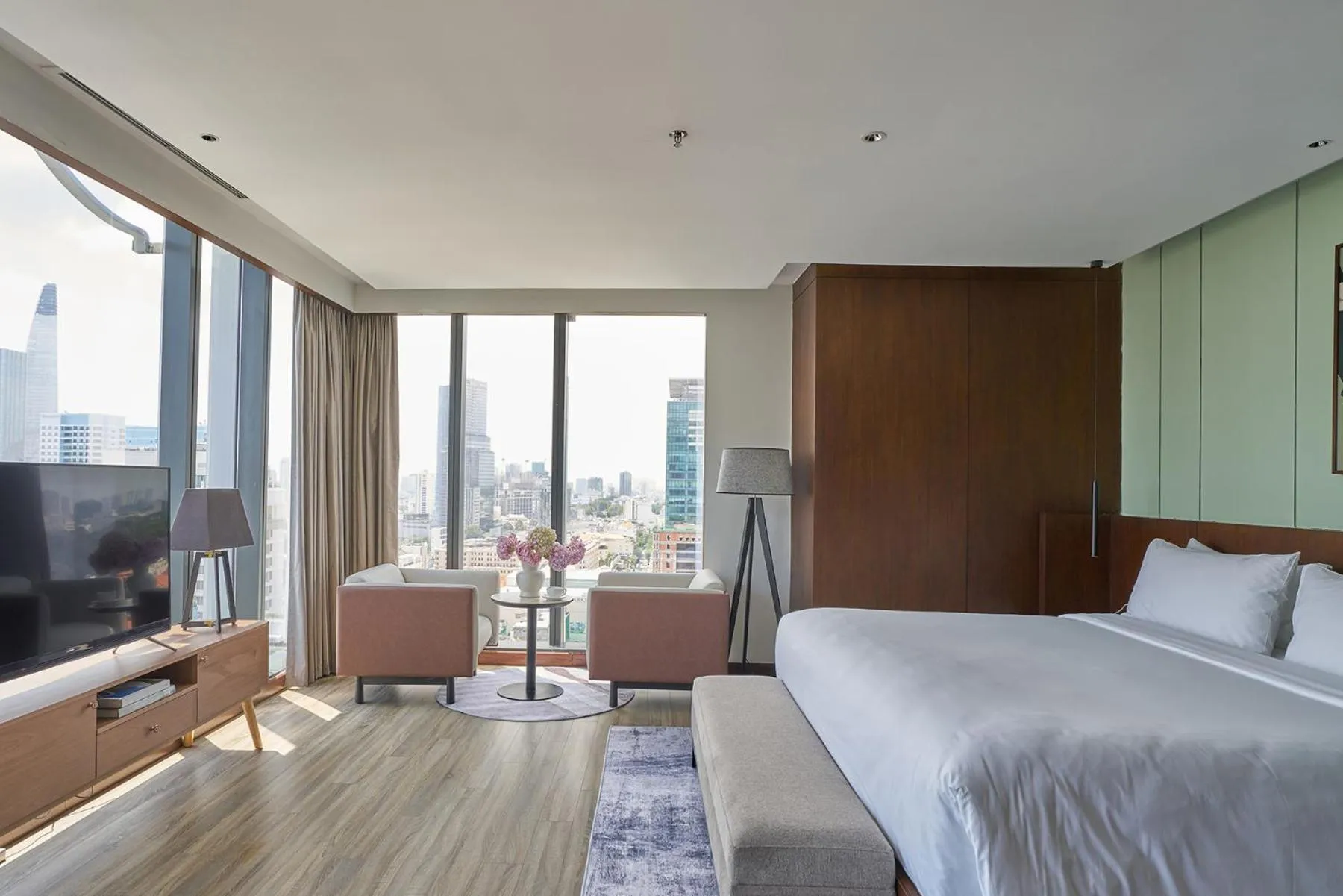 Communal lounge/ TV room, Bed in Signature by M Village Lê Thánh Tôn