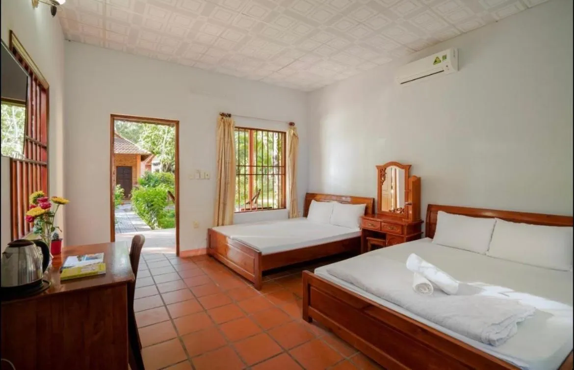 Bed in Huong Giang Bungalow