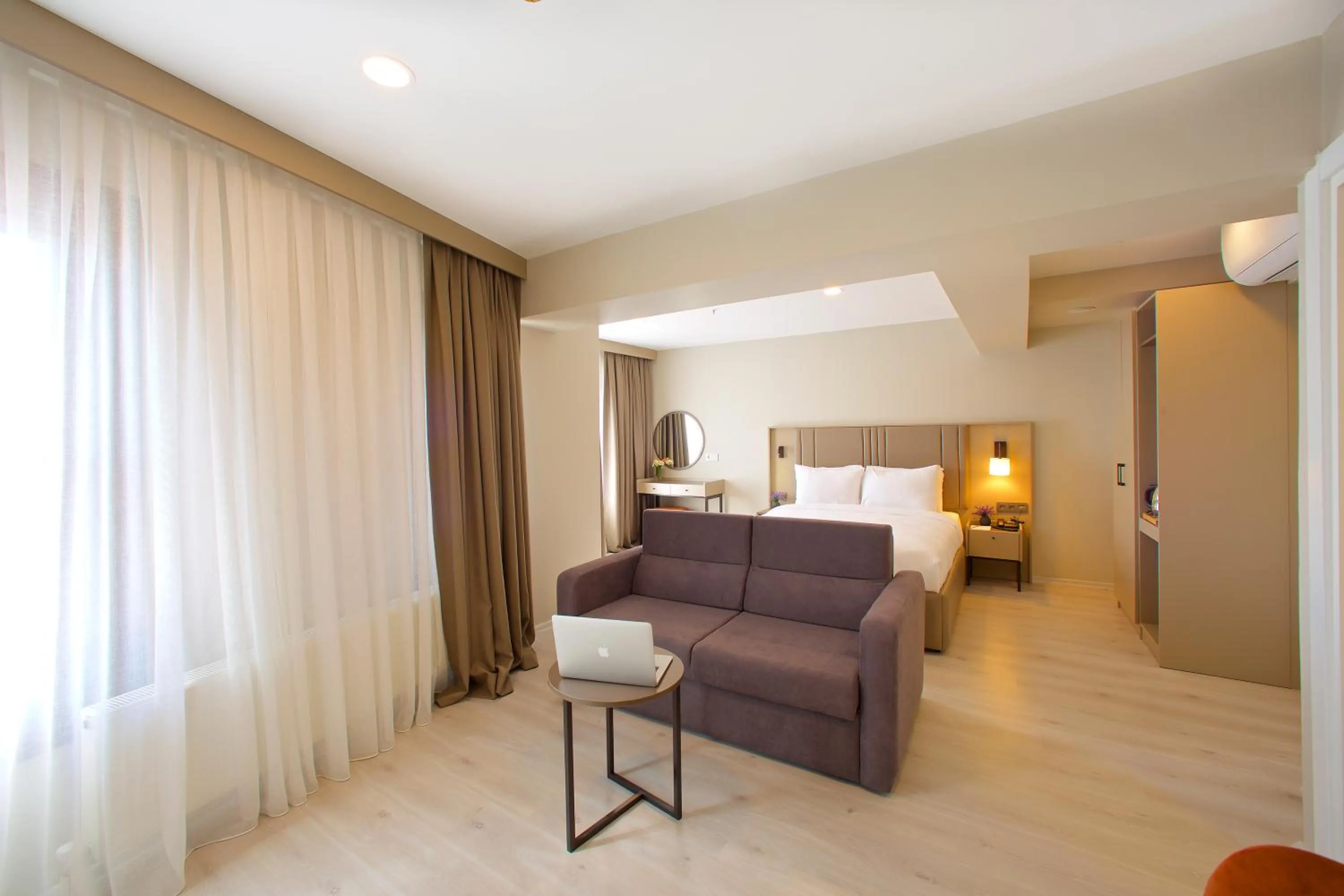 Seating area, Bed in Joy Taksim