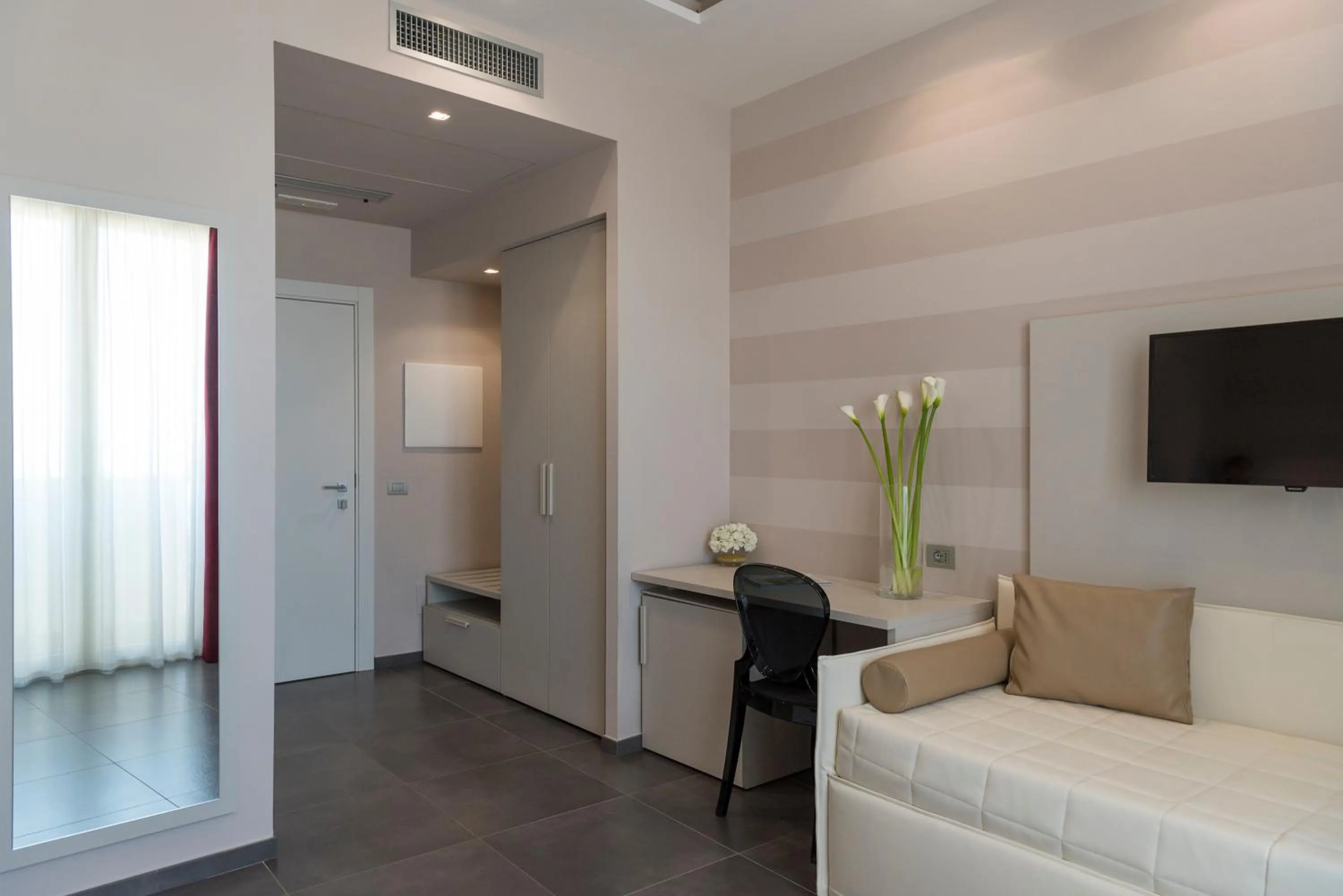 Bedroom in Grand Hotel Biffy