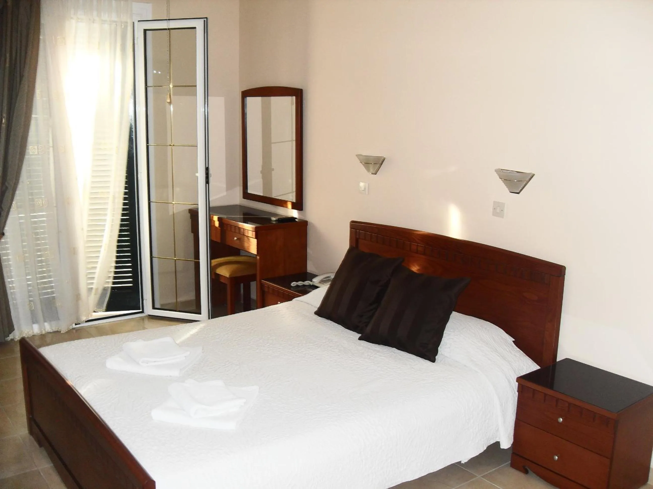 Bed in Hotel Pavlos - Studios