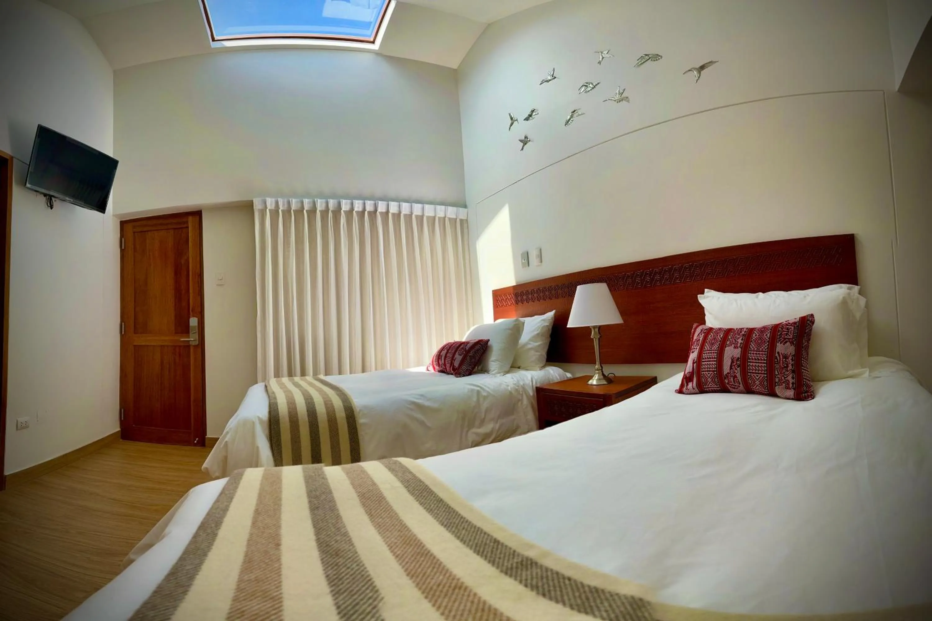 Bed in Inkantari Boutique Hotel