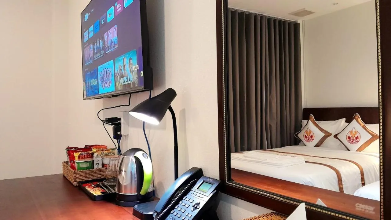 Bed in THE RICE HOTEL