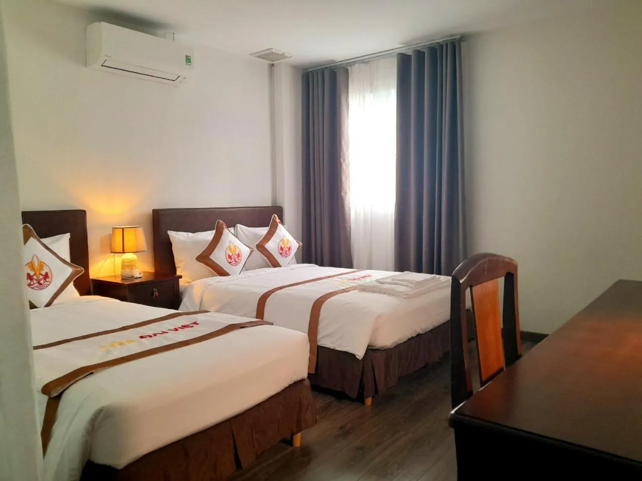 Bed in THE RICE HOTEL