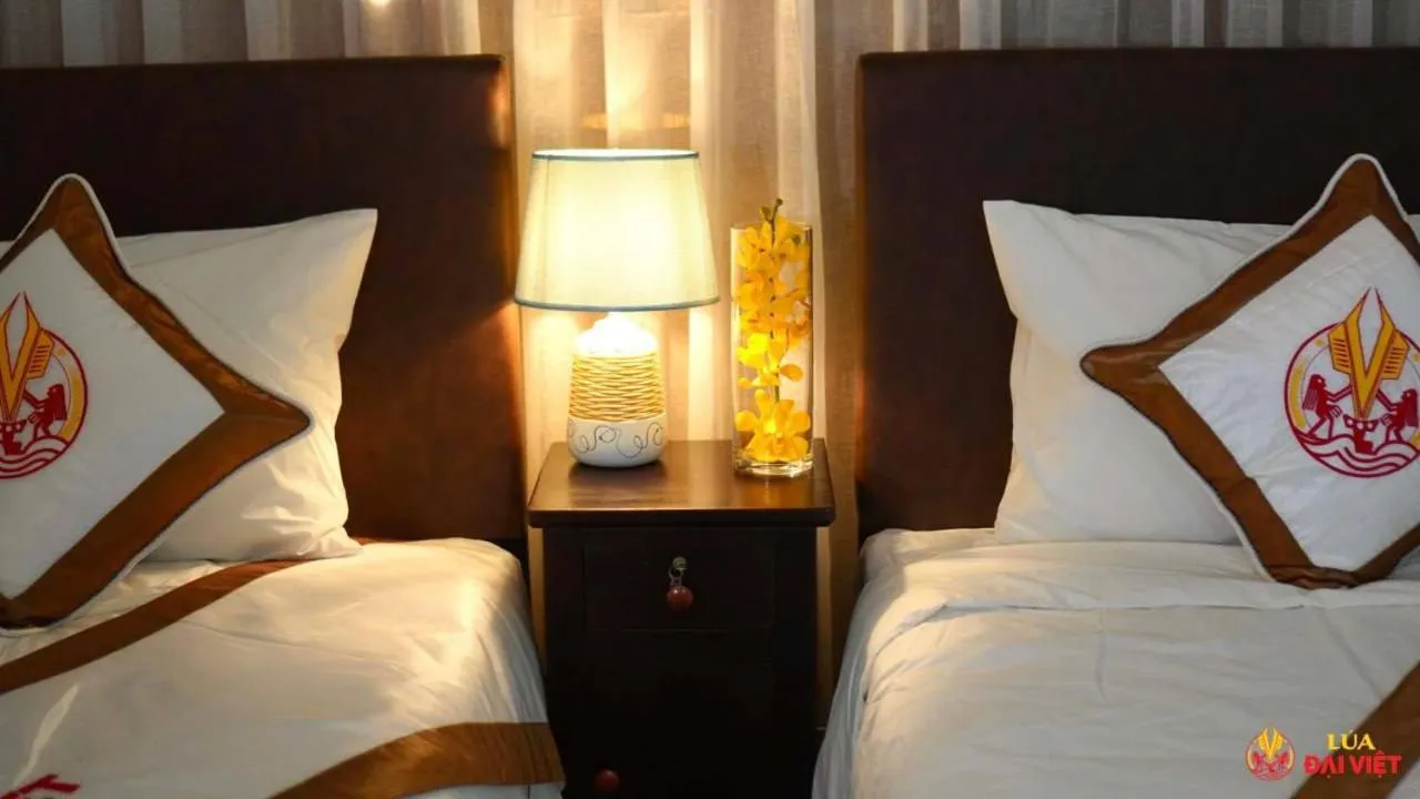 Bed in THE RICE HOTEL