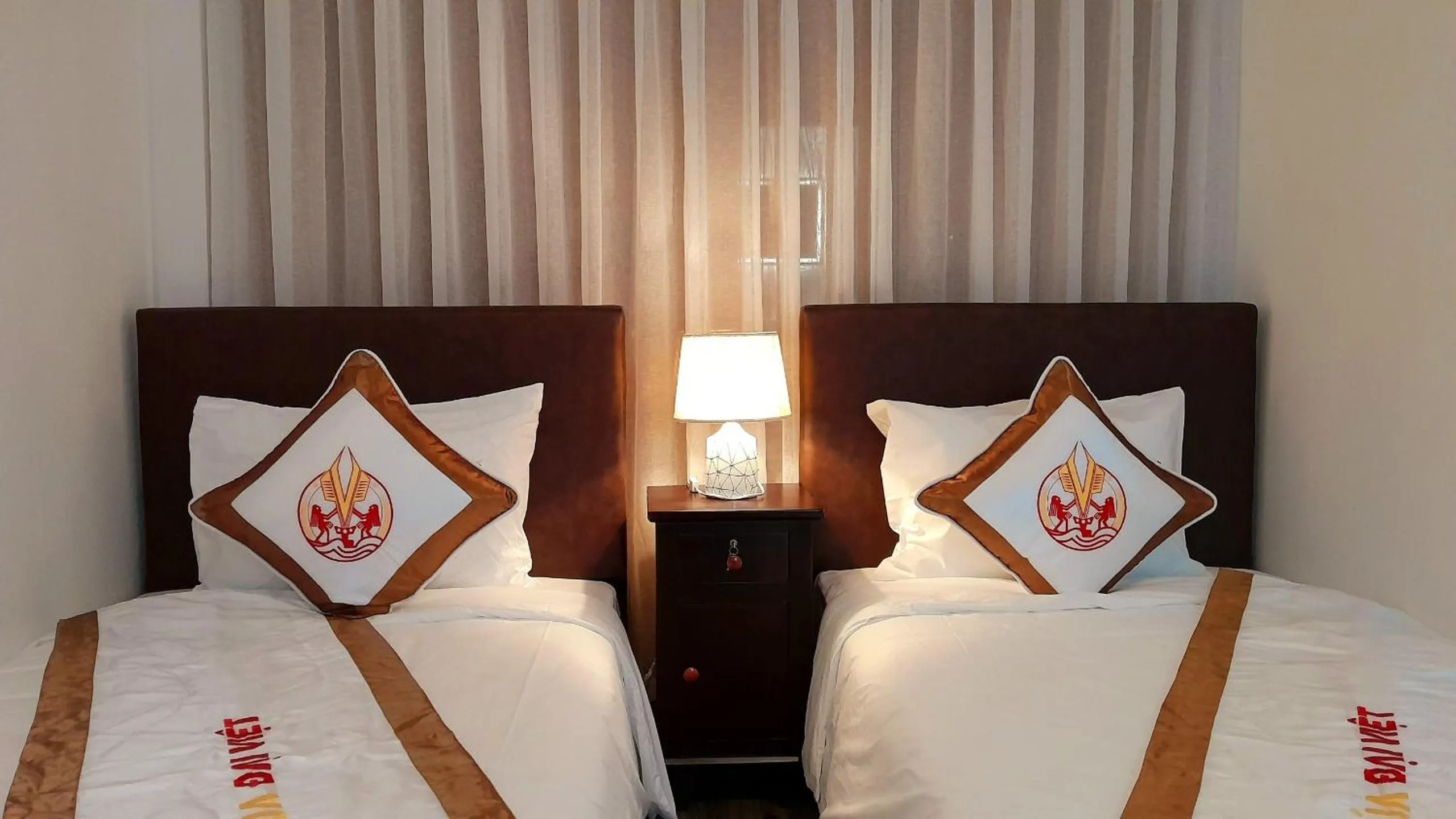 Bed in THE RICE HOTEL