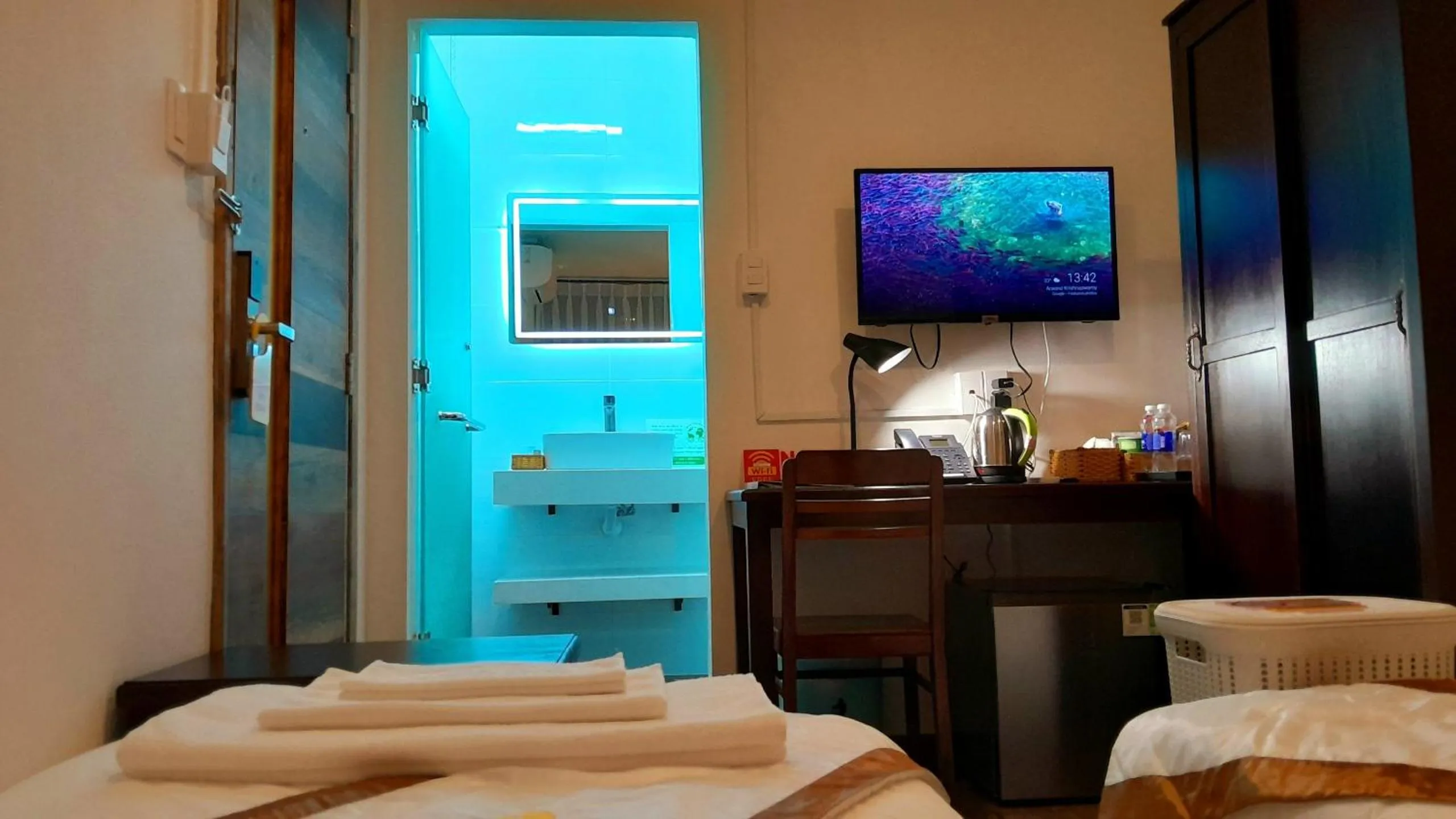 Bed in THE RICE HOTEL