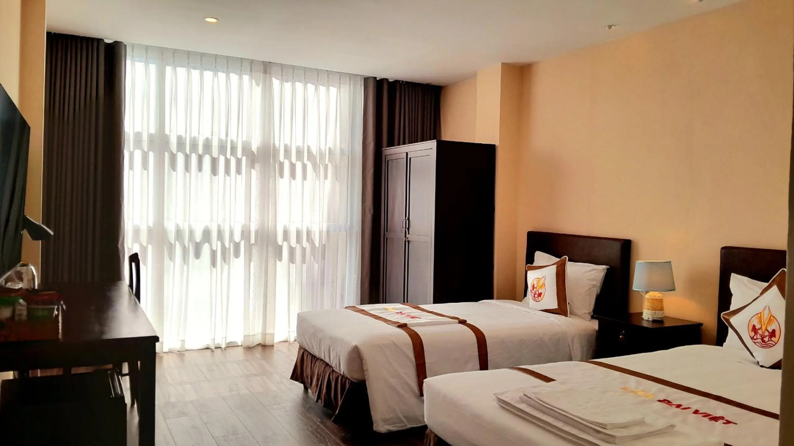 Bed in THE RICE HOTEL