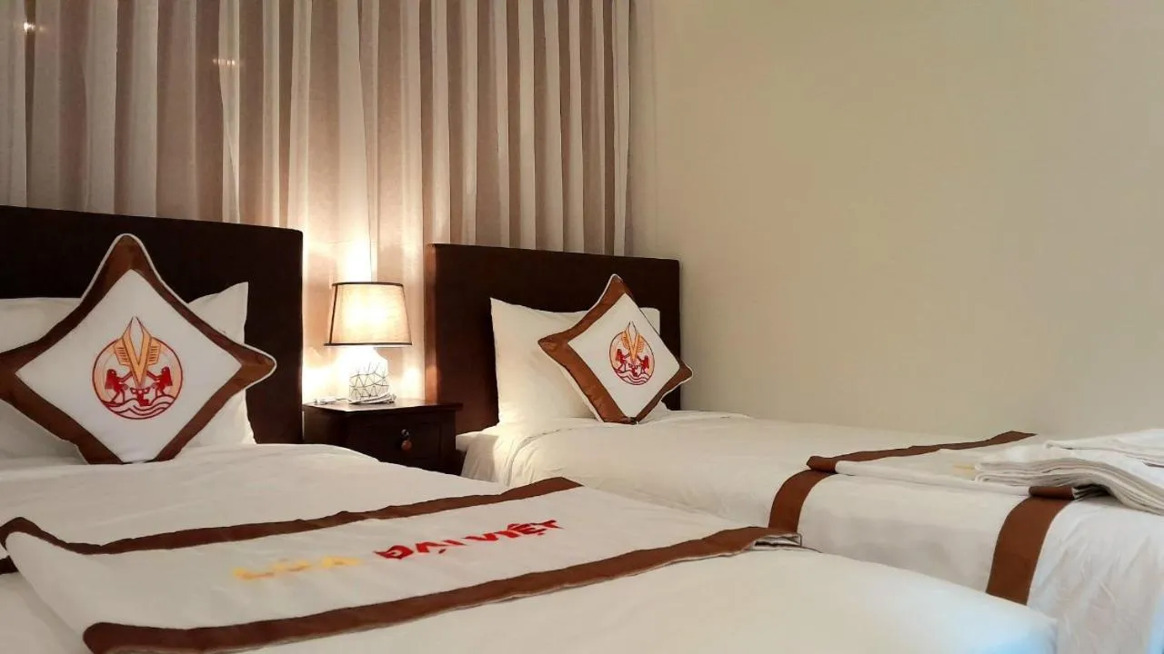 Bed in THE RICE HOTEL