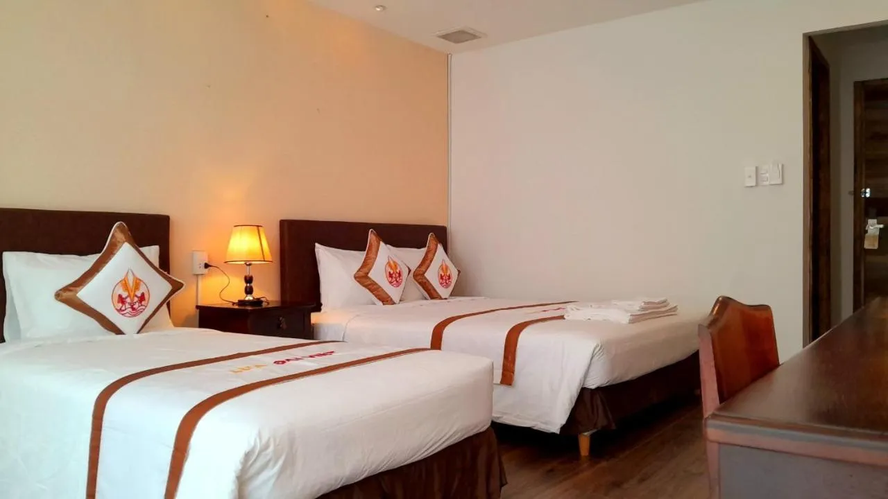 Bed in THE RICE HOTEL