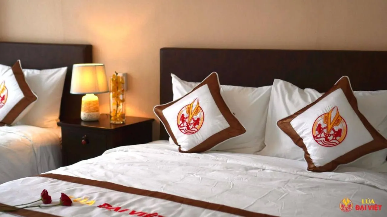 Bed in THE RICE HOTEL