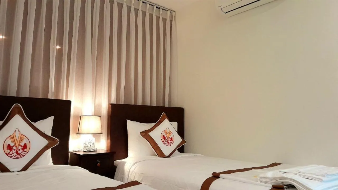 Bed in THE RICE HOTEL