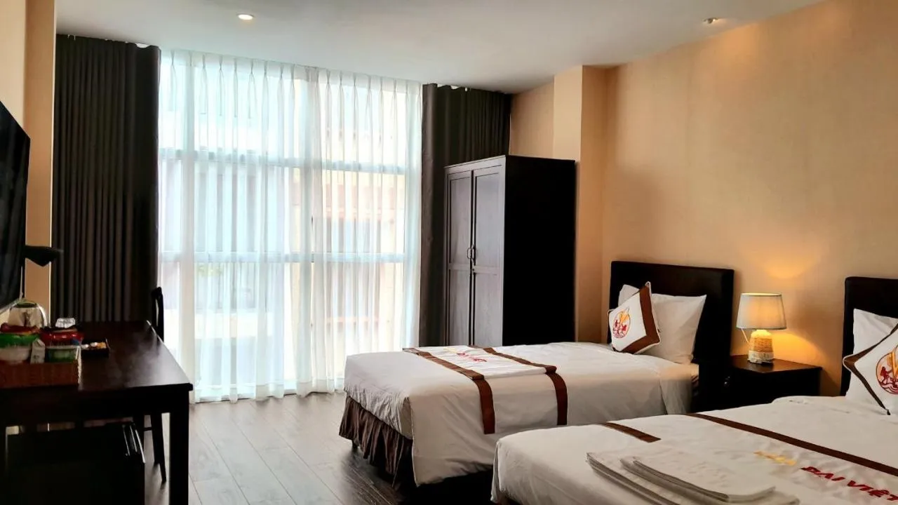 Bed in THE RICE HOTEL