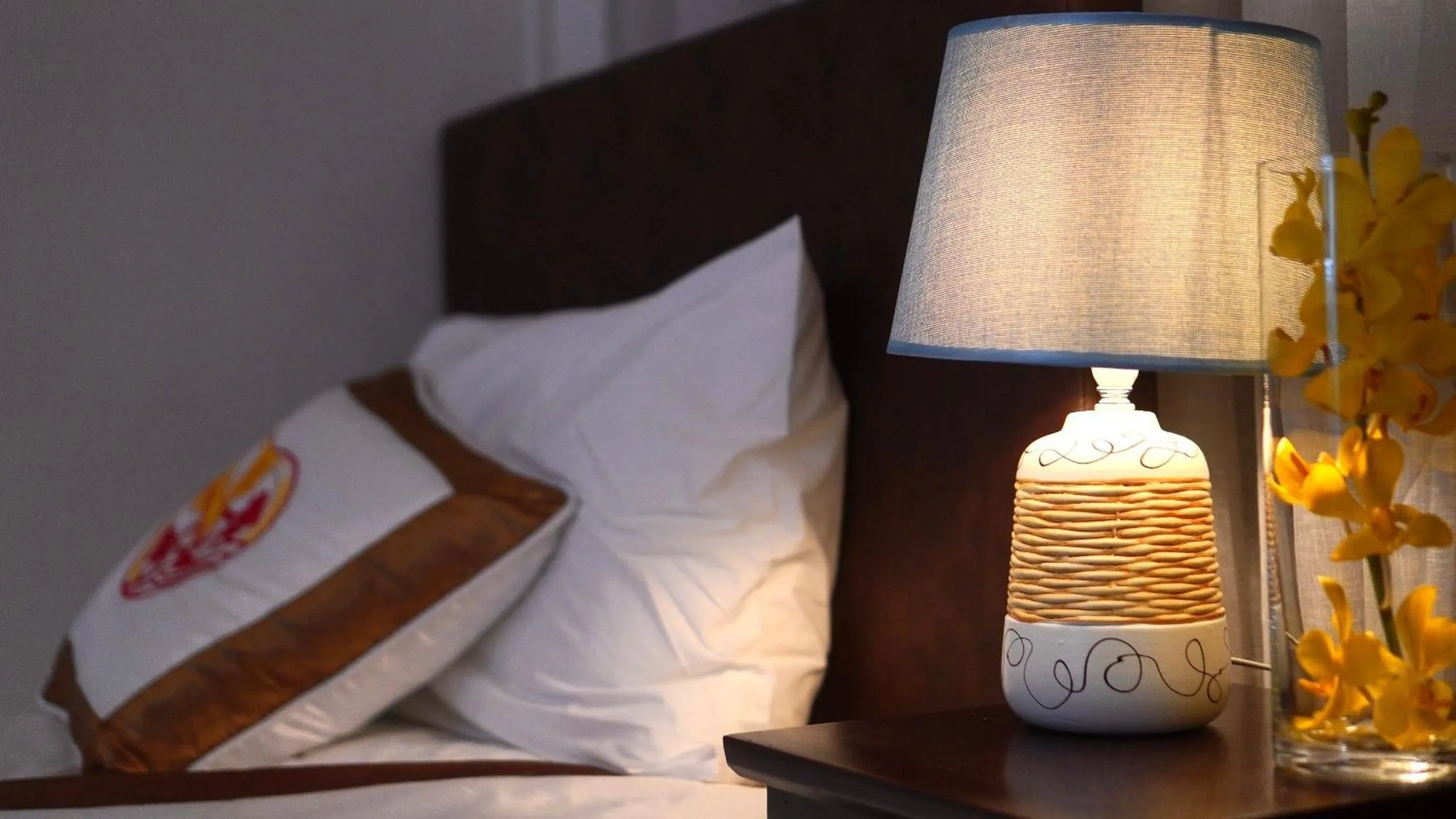 Bed in THE RICE HOTEL