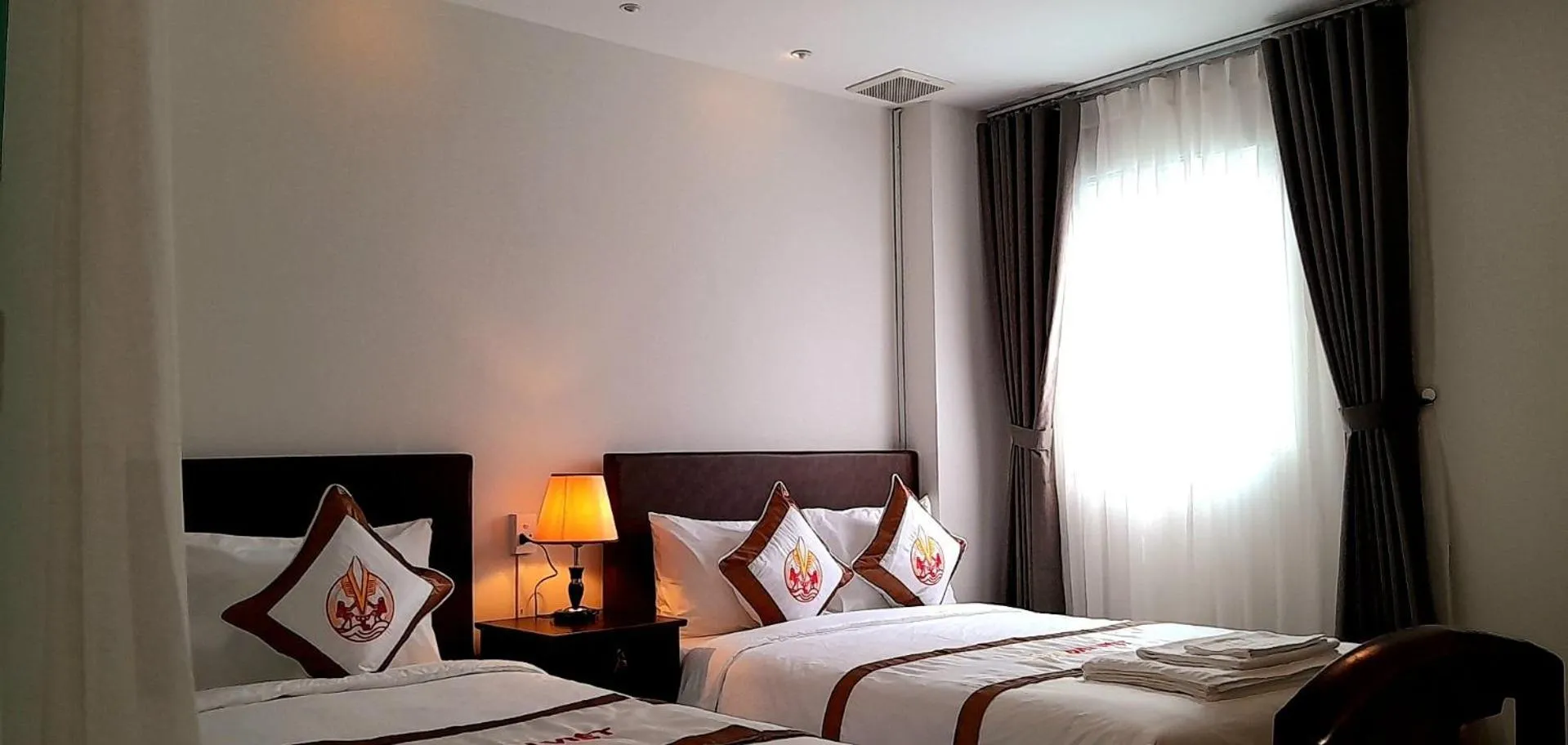 Bed in THE RICE HOTEL