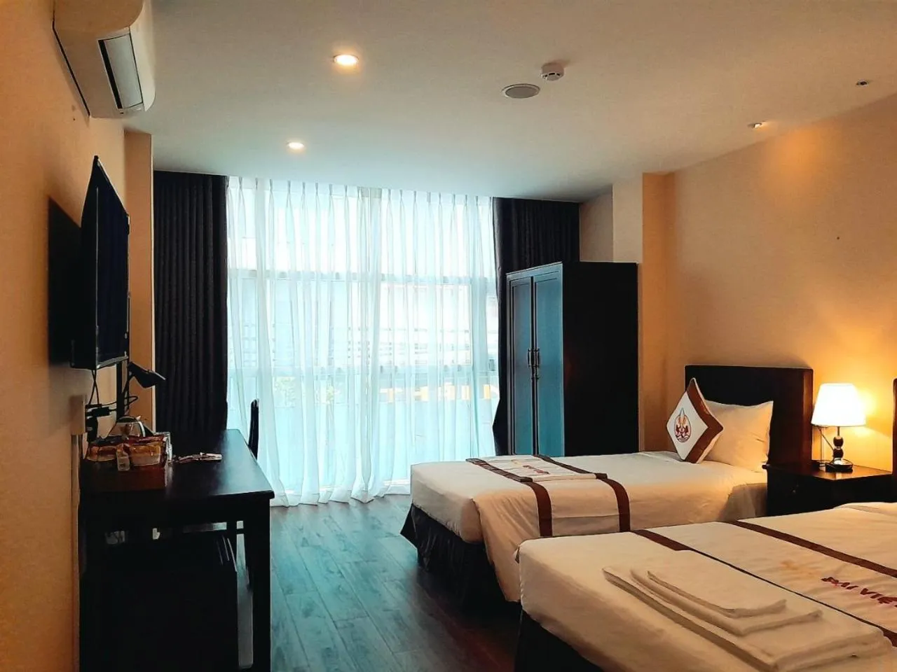 Bed in THE RICE HOTEL