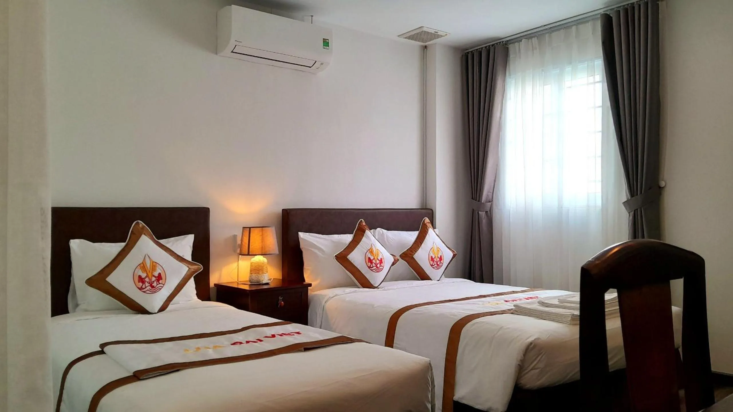 Bed in THE RICE HOTEL