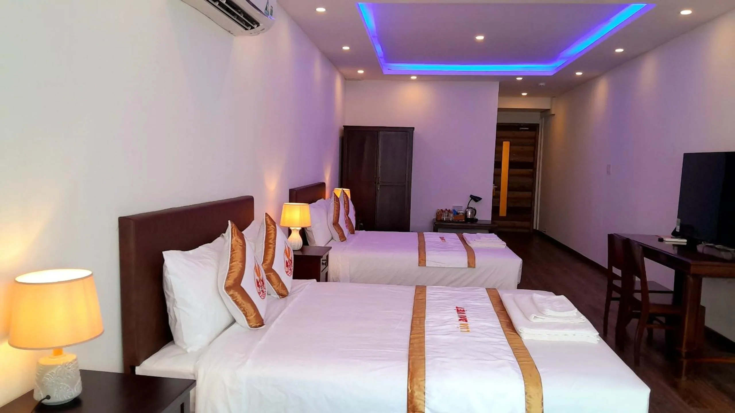 Bed in THE RICE HOTEL