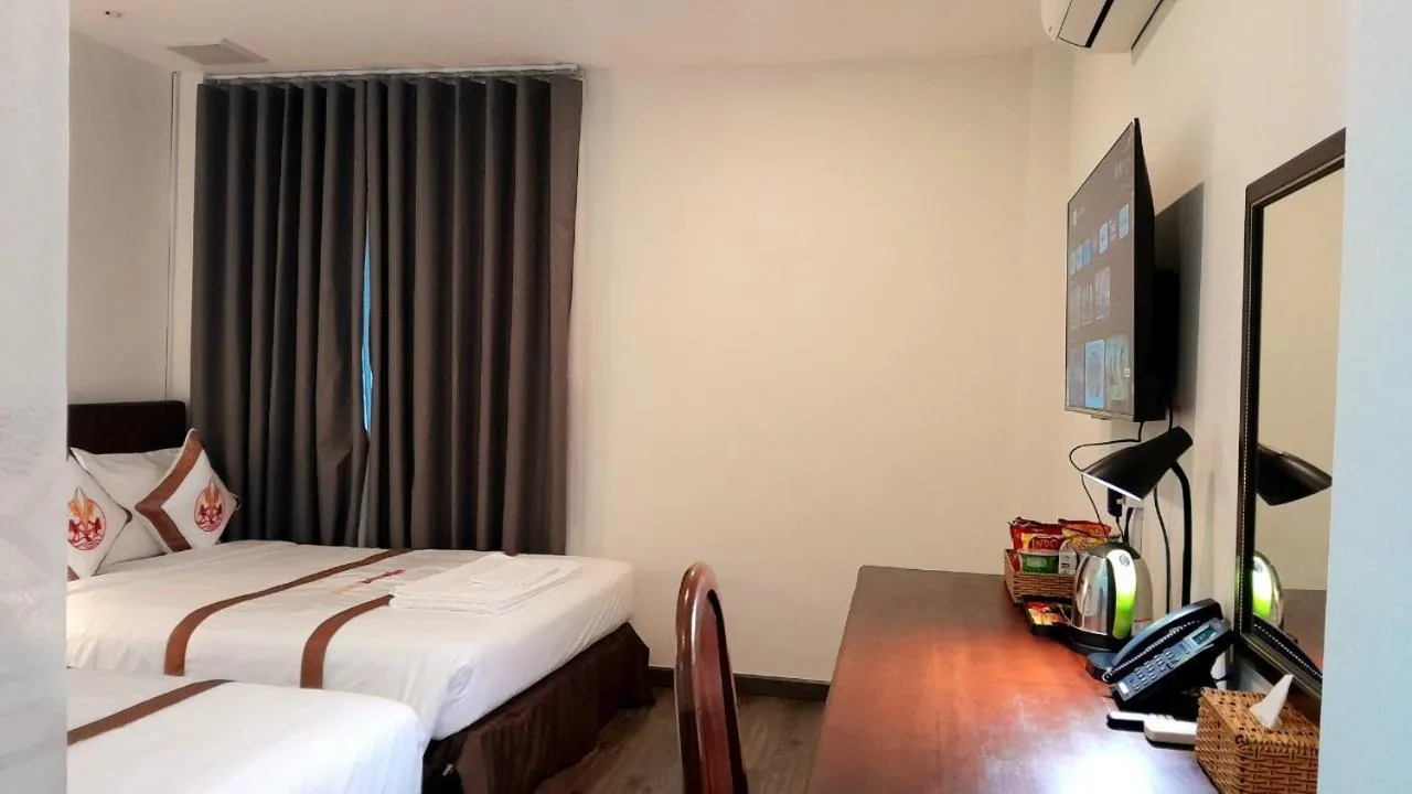 Bed in THE RICE HOTEL