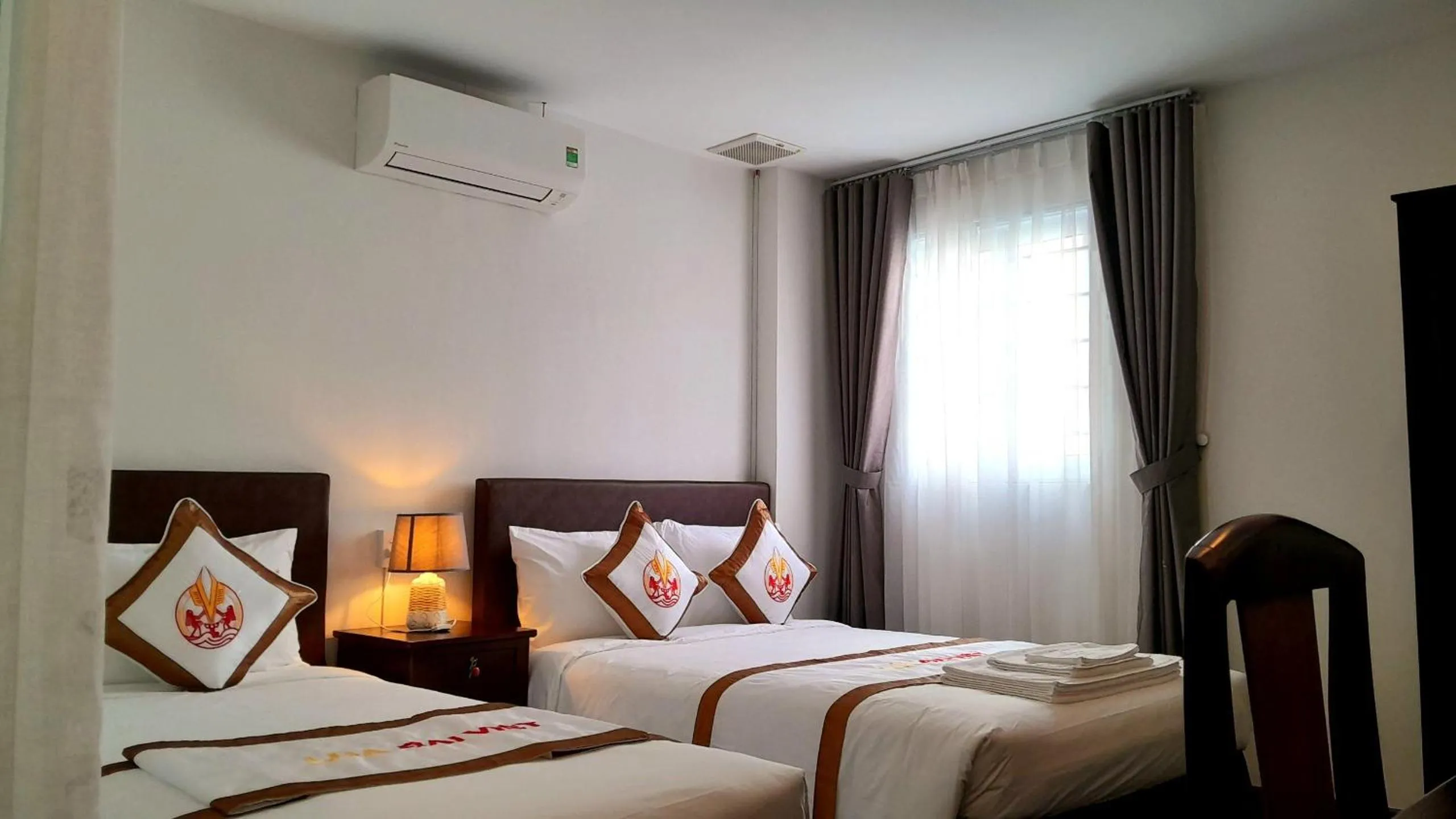 Bed in THE RICE HOTEL