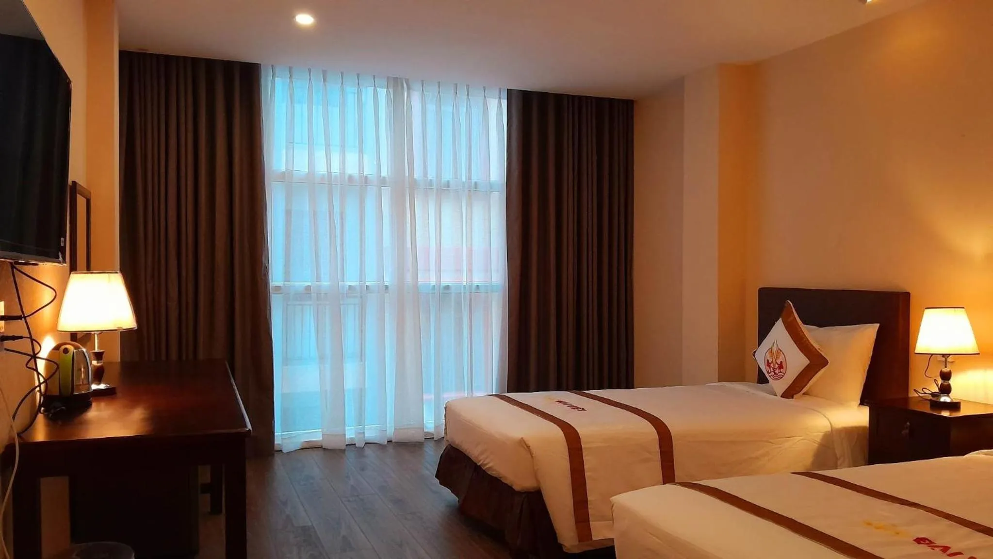 Bed in THE RICE HOTEL