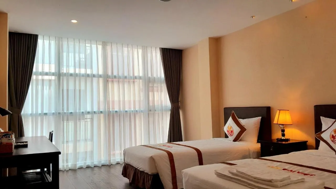 Bed in THE RICE HOTEL