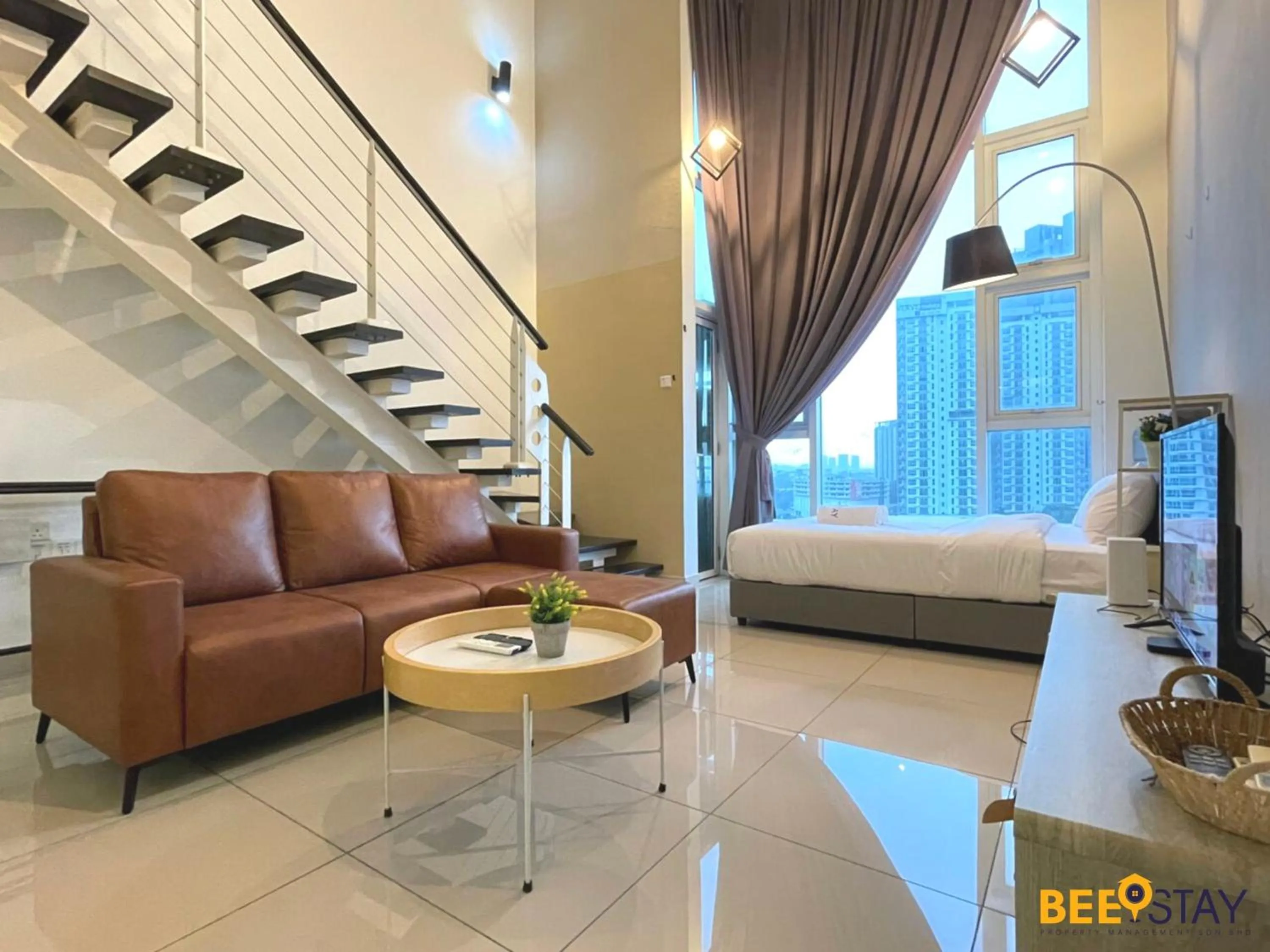 Living room, Bed in The Scott Garden Kuala Lumpur by BeeStay Management