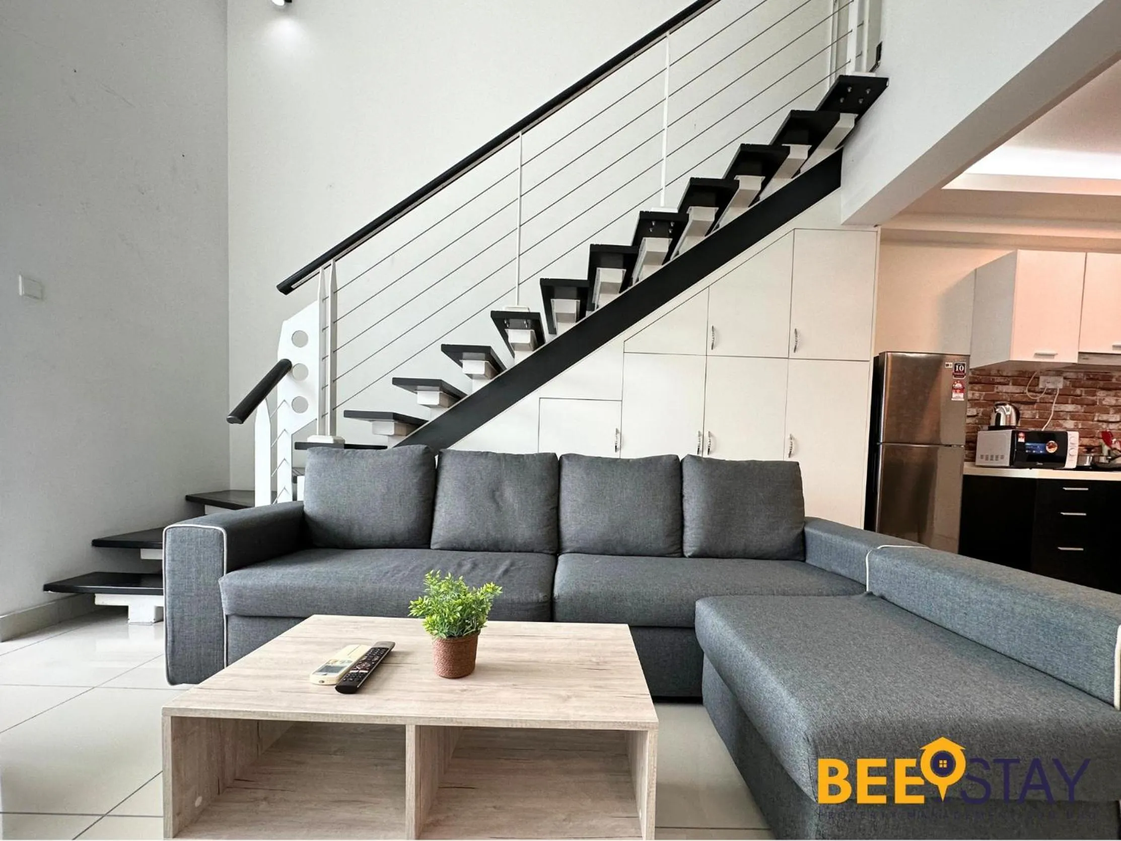 Living room in The Scott Garden Kuala Lumpur by BeeStay Management