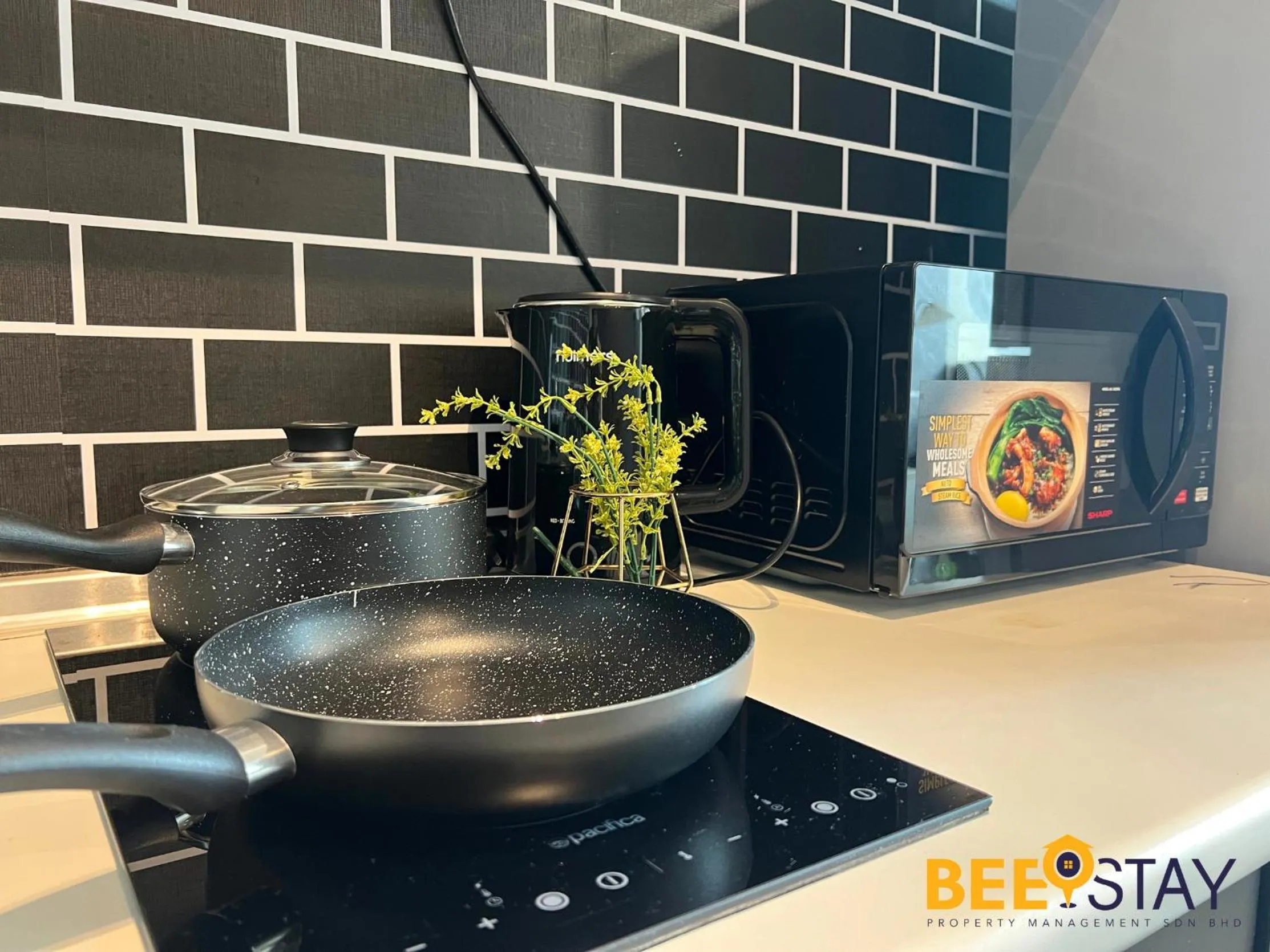 Kitchen or kitchenette in The Scott Garden Kuala Lumpur by BeeStay Management