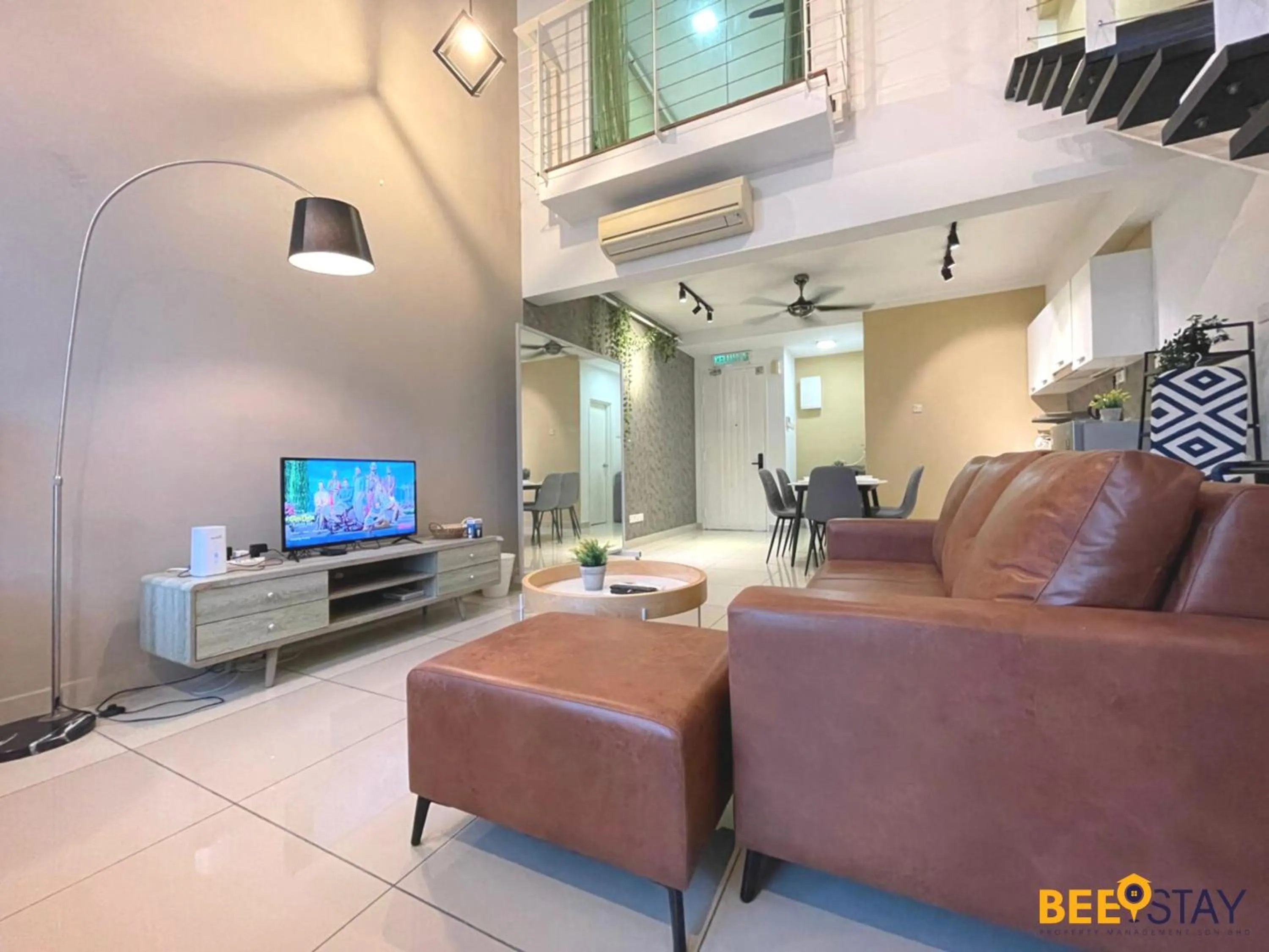 Living room in The Scott Garden Kuala Lumpur by BeeStay Management